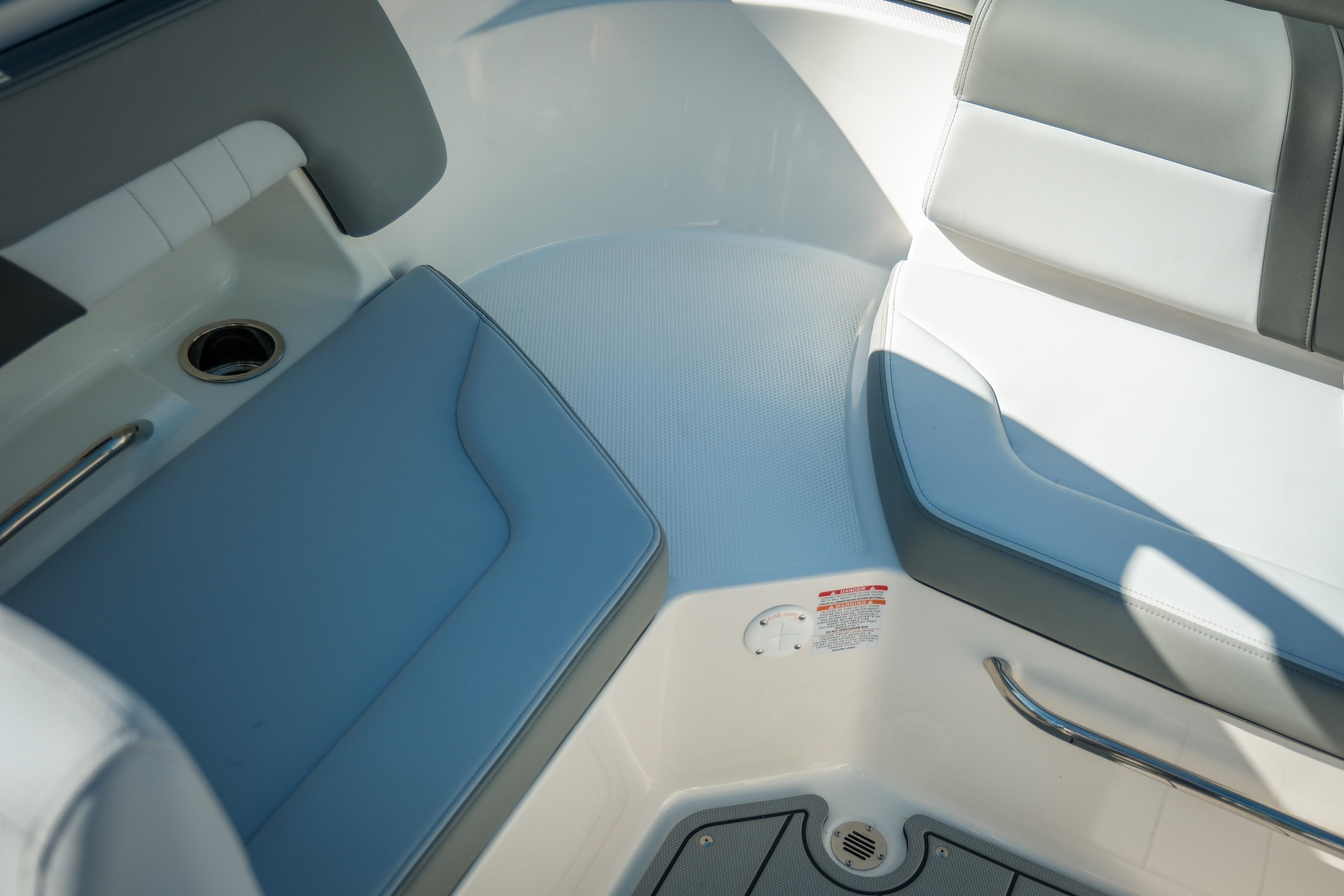 Interior seating of 2026 Chaparral 23 SSi boat, featuring sleek design and comfortable upholstery.