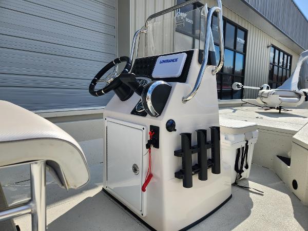 2025 Ranger RB200 boat console with steering wheel and rod holders.