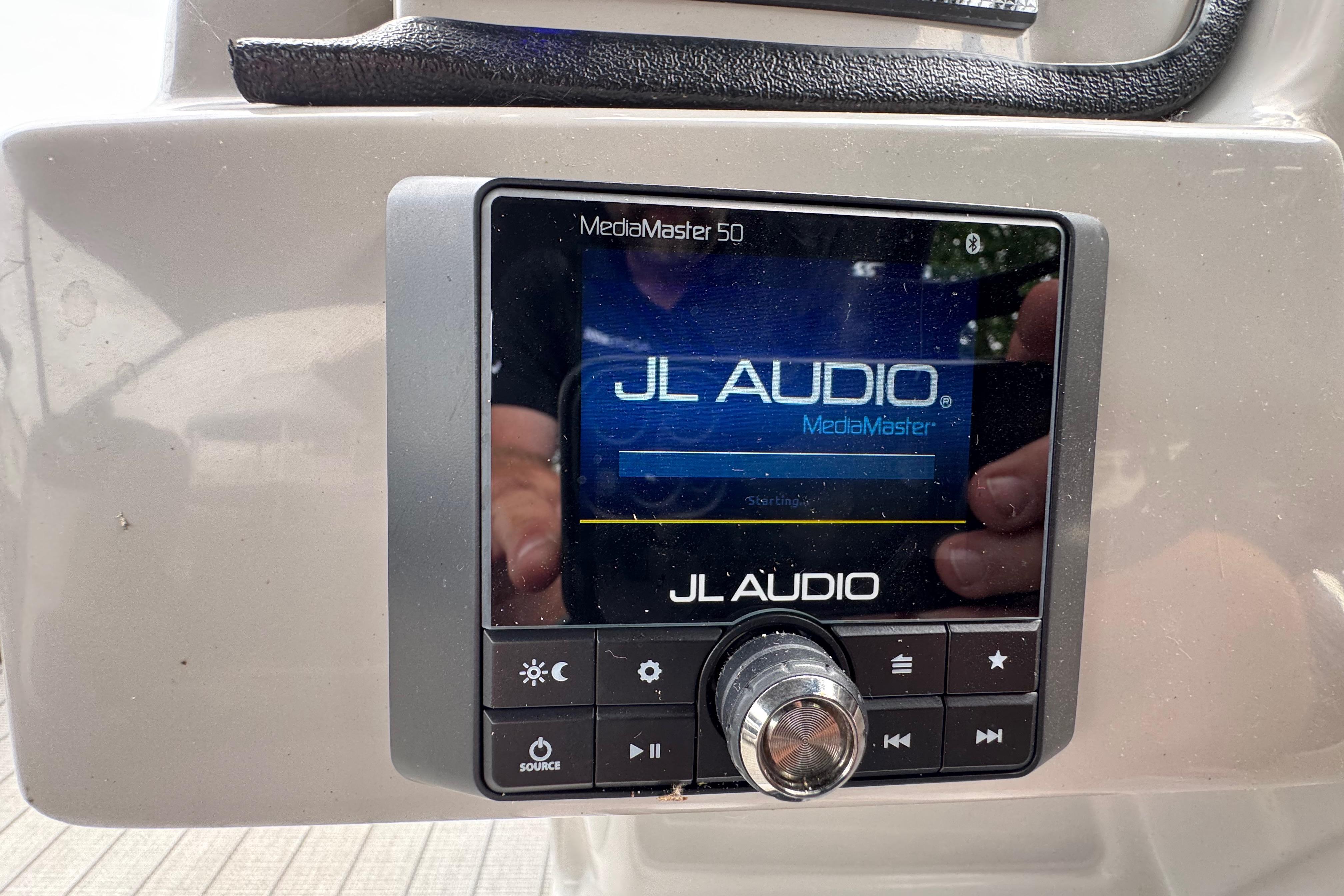 JL Audio MediaMaster 50 control panel on 2023 Starcraft MX 25 DL DH boat.