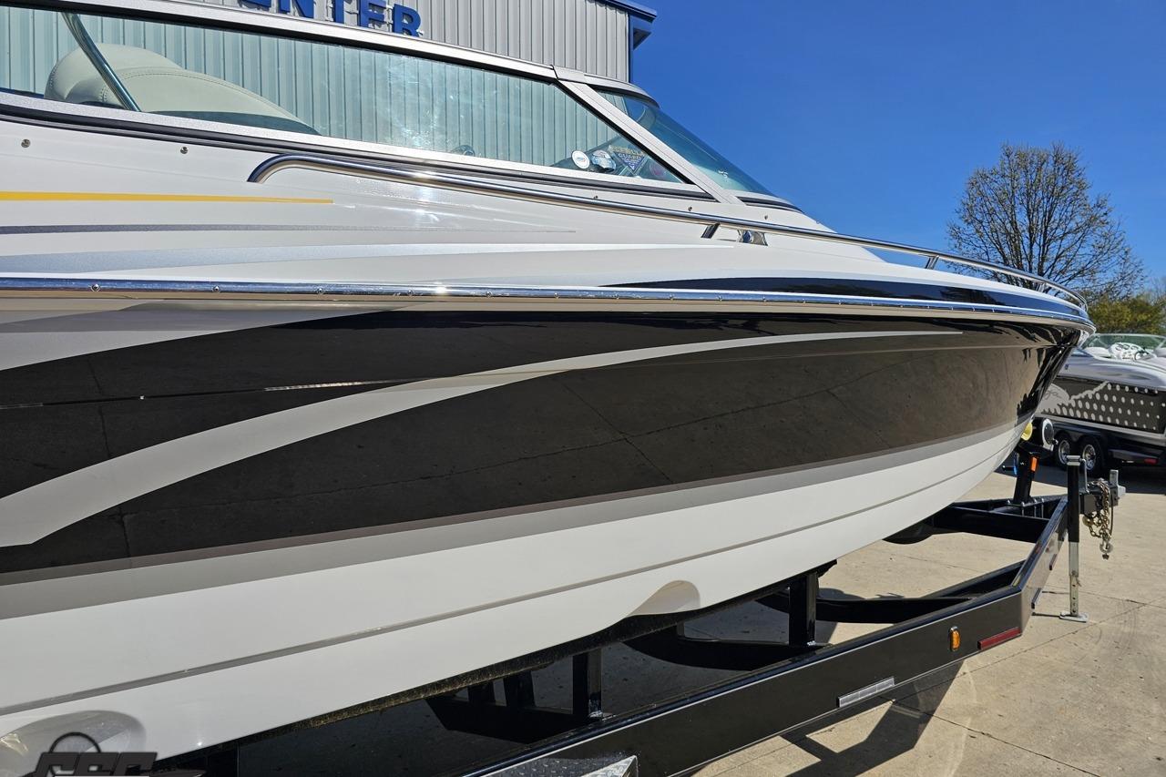 2014 Formula 292 FASTech boat on trailer, sleek design, sunny day.