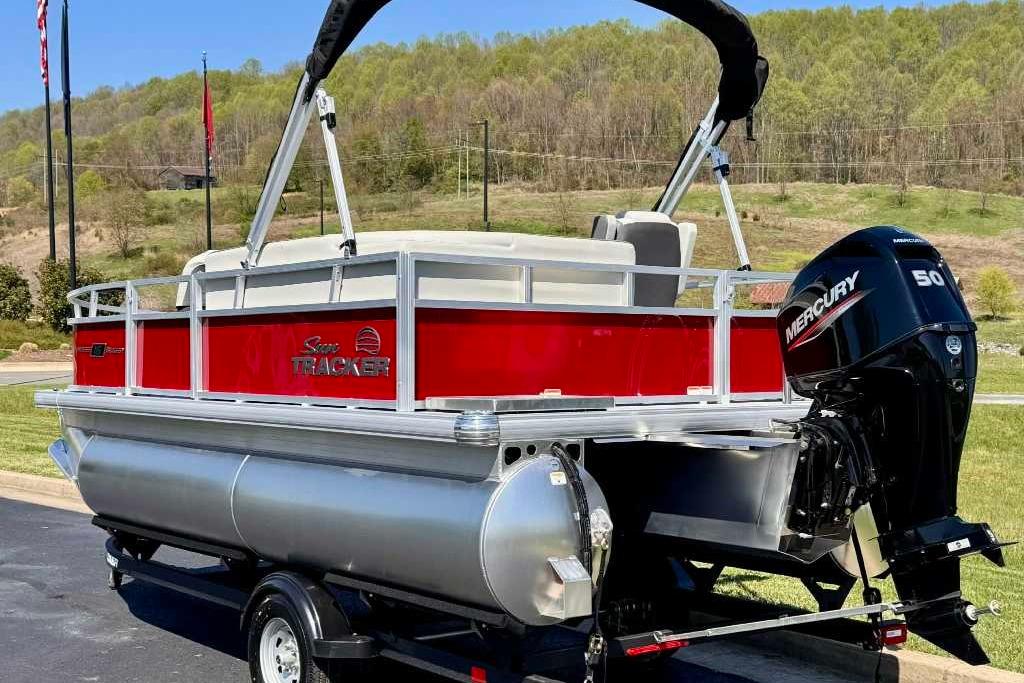 2026 Sun Tracker Bass Buggy 16 XL Select pontoon boat with Mercury 50 engine.