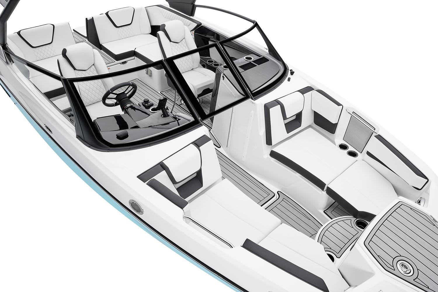 Manufacturer Provided Image: 2026 Yamaha Boats 222S interior, featuring sleek white and black seating with modern design.