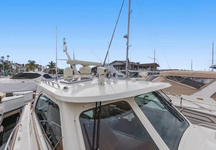 2009 Hinckley Talaria 44 yacht docked, side view.