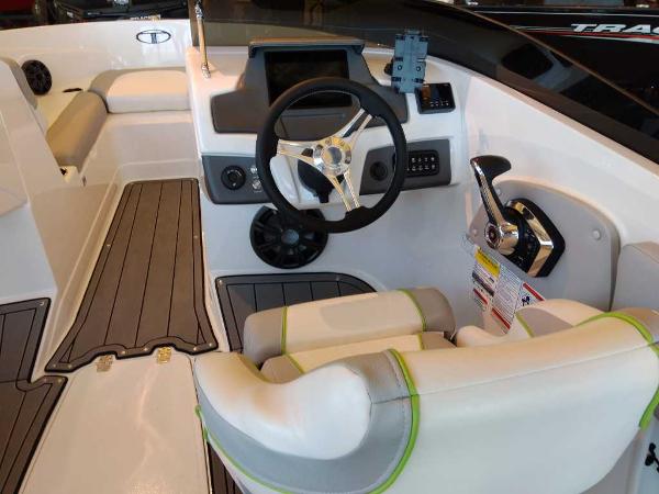 2023 Tahoe 210 Si Limited boat interior with steering wheel and control panel.