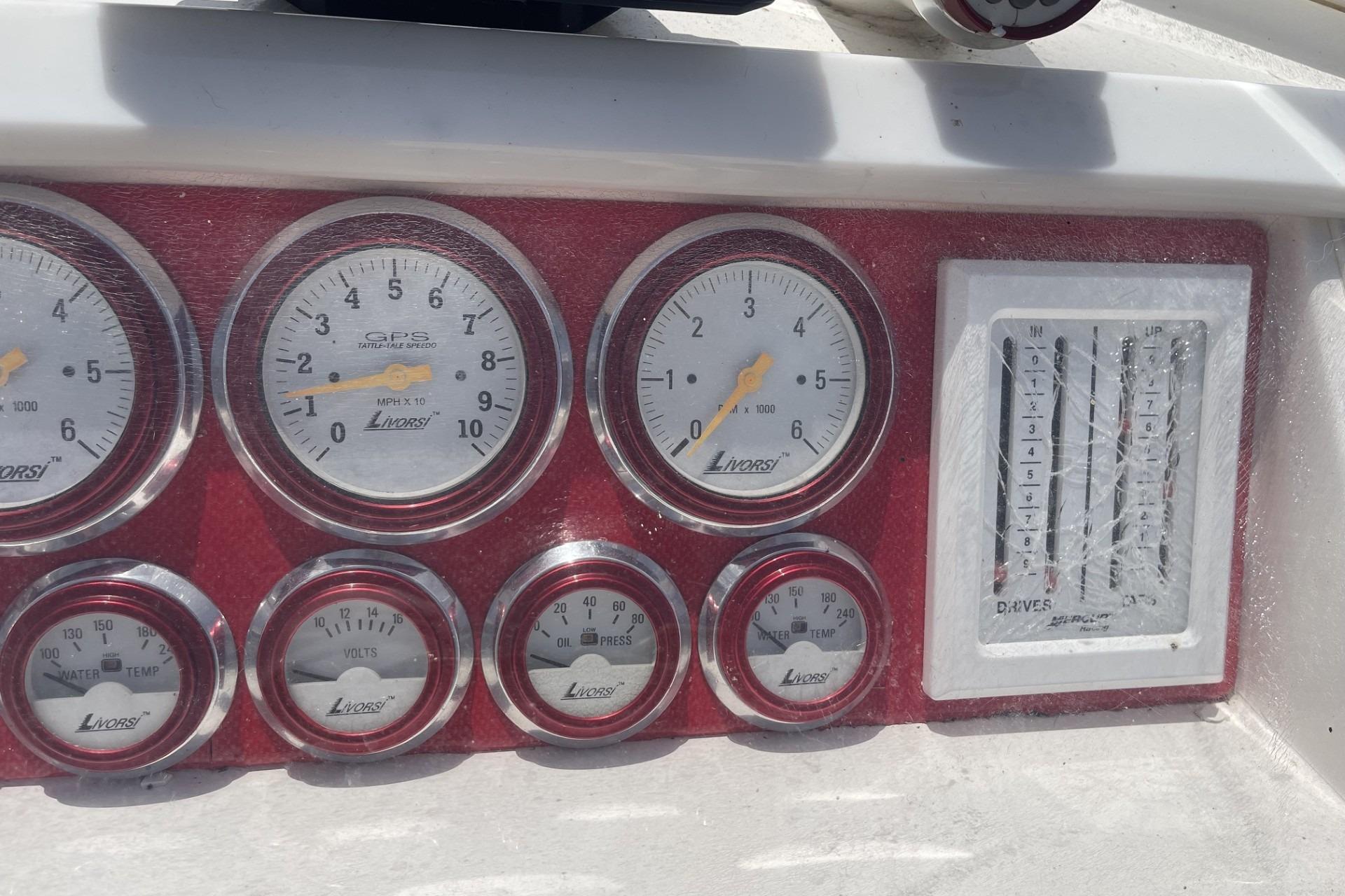 Dashboard of a 2006 Sonic 386 boat with Livorsi gauges and controls.