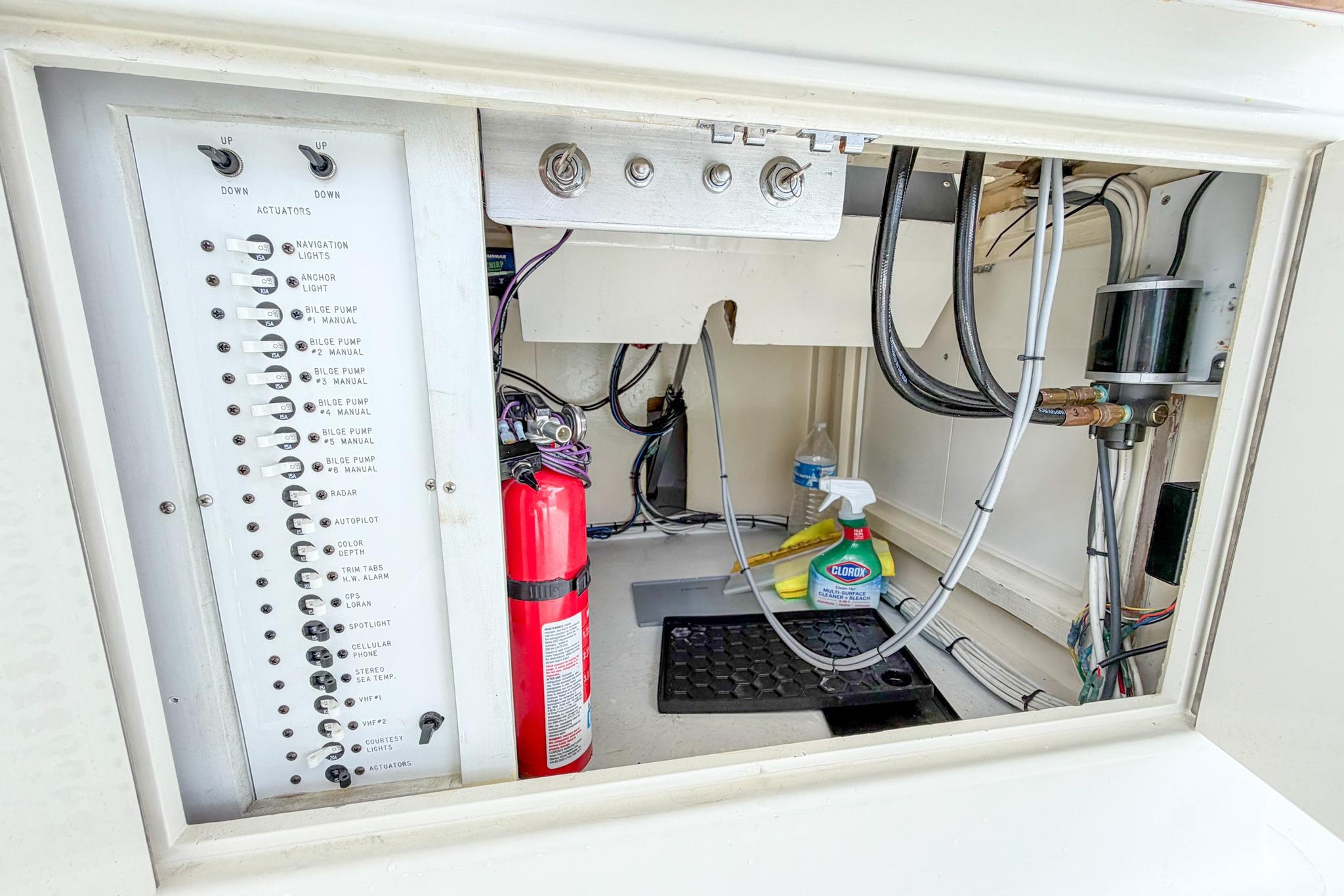 Electrical panel and storage compartment on a 1998 Blackwell Custom Carolina Sportfish boat.
