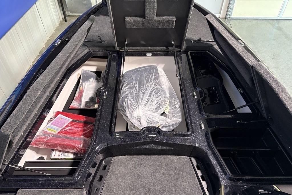 2026 Skeeter ZXE21 boat storage compartments with equipment and accessories.