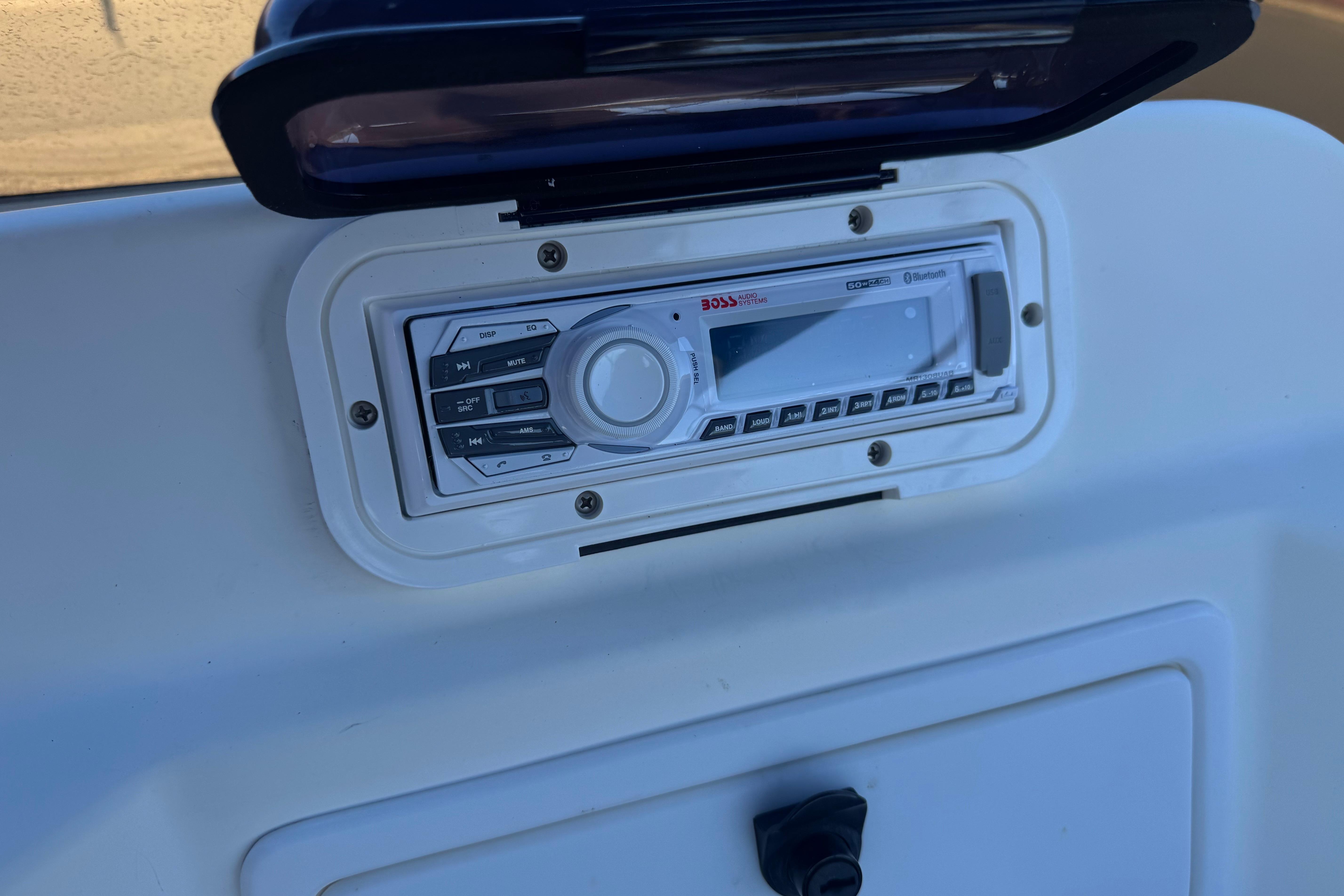 Boat stereo system on a 2007 Commander 2300LX, featuring a Boss Audio unit.