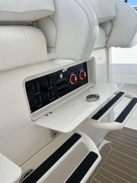 2021 Regulator 41 boat interior with control panel and seating.
