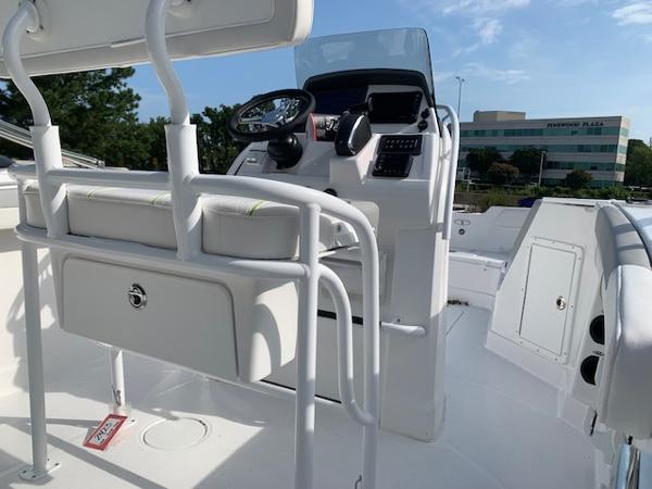 2024 Tahoe 2150 CC boat interior with steering console and seating.