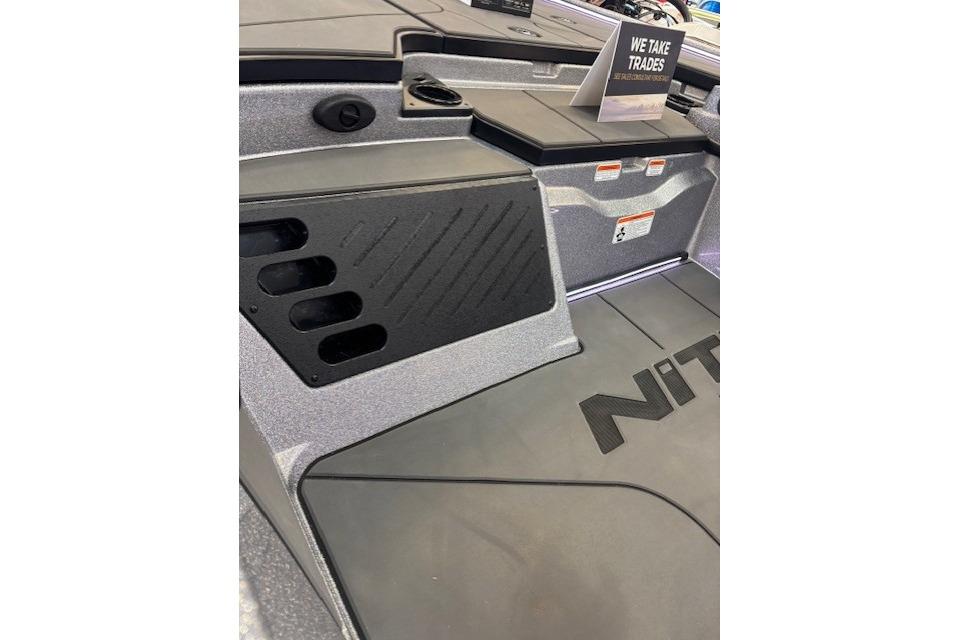 2026 Nitro Z19 XL boat interior with storage compartments and trade-in sign.