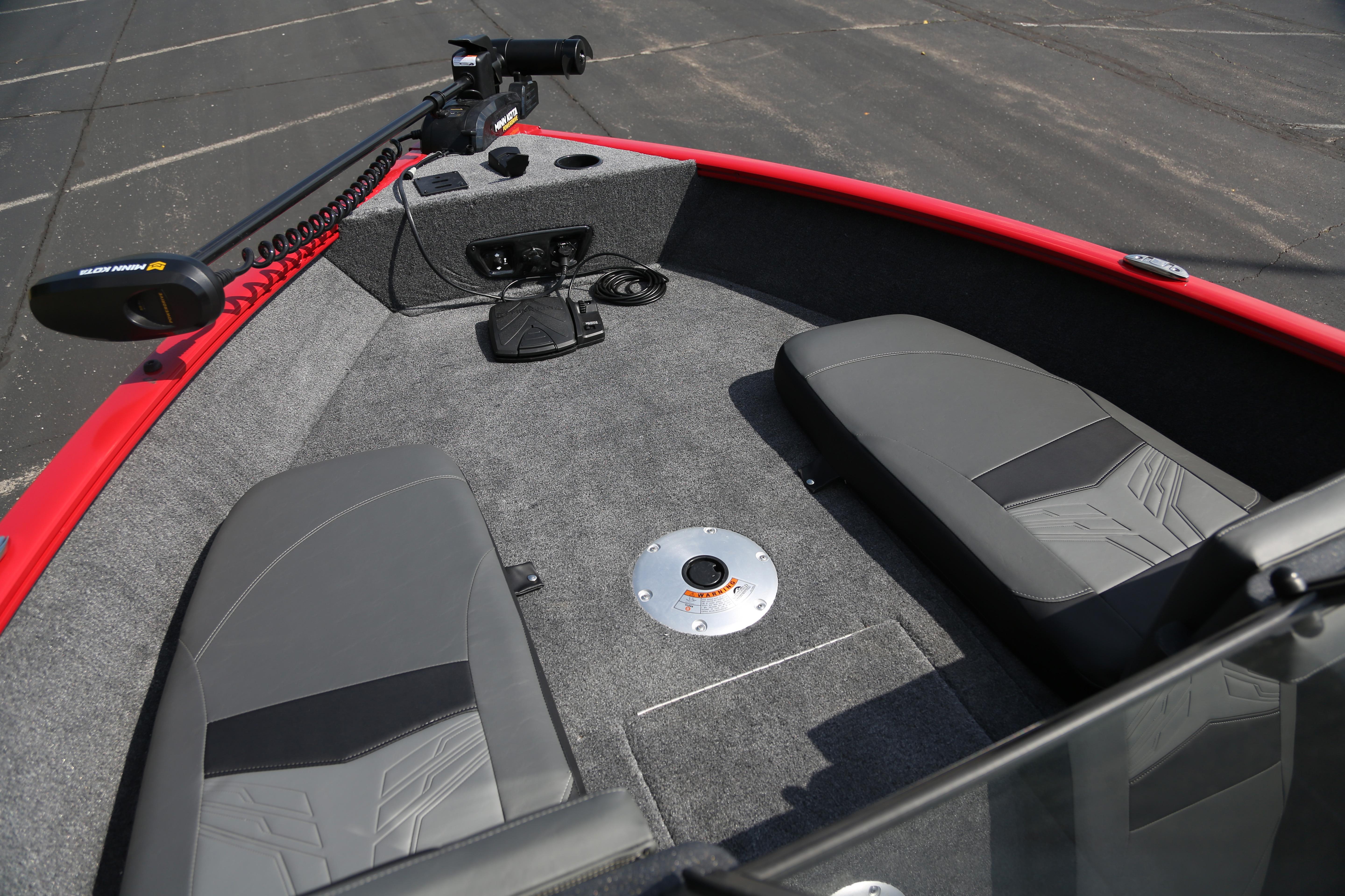 2026 Tracker Pro Guide V-175 Combo boat interior with gray seating and trolling motor.