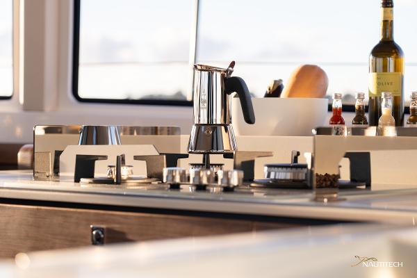 Modern kitchen on Nautitech 48 Open yacht, featuring sleek appliances and elegant design, 2025 model.