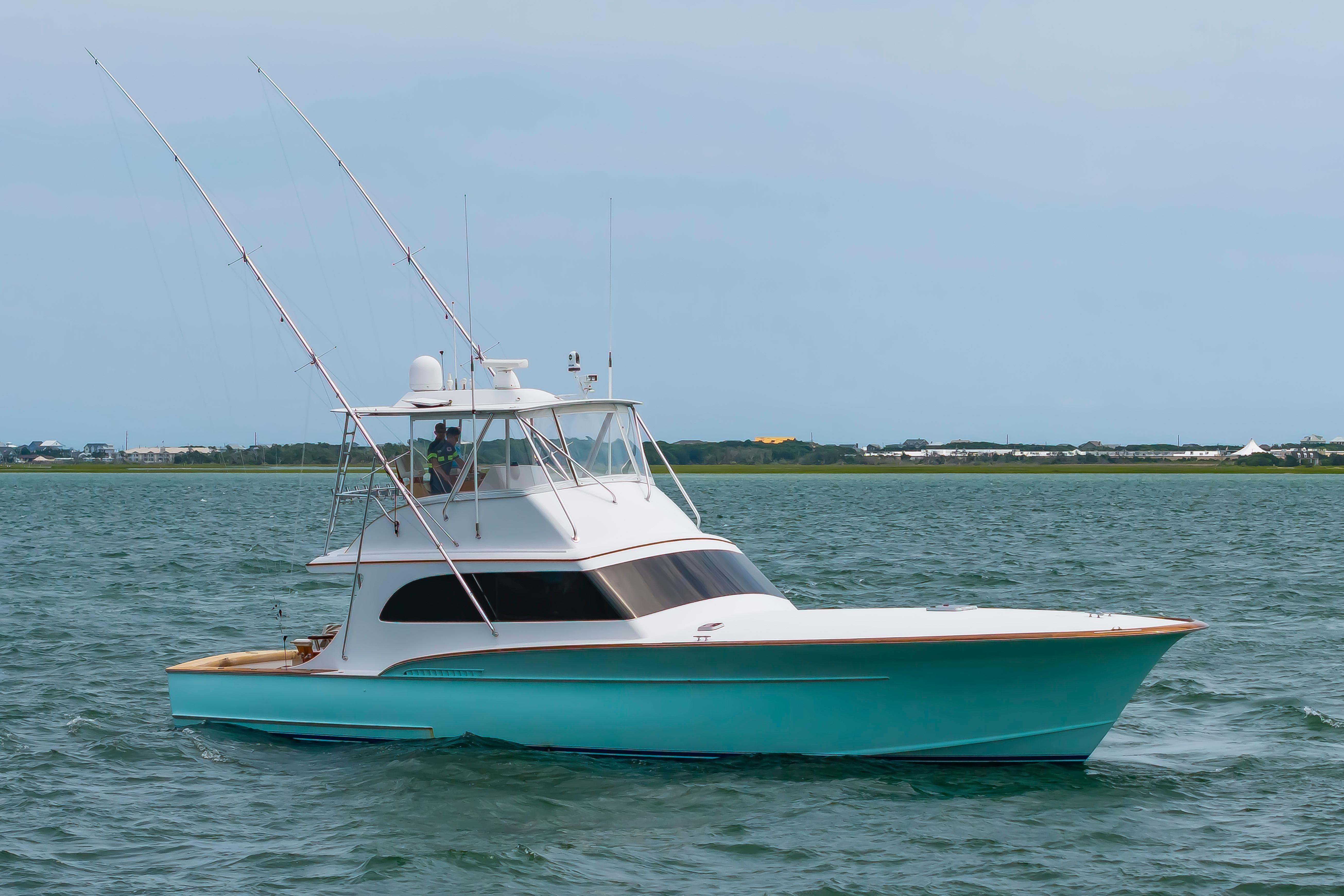 Custom Carolina Scarborough 56 Convertible yacht, 1993 model, cruising on open water.