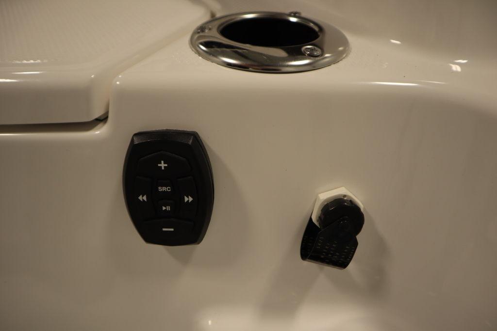 Control panel on 2026 Yamaha Boats 255 FSH Sport E, featuring audio and accessory controls.