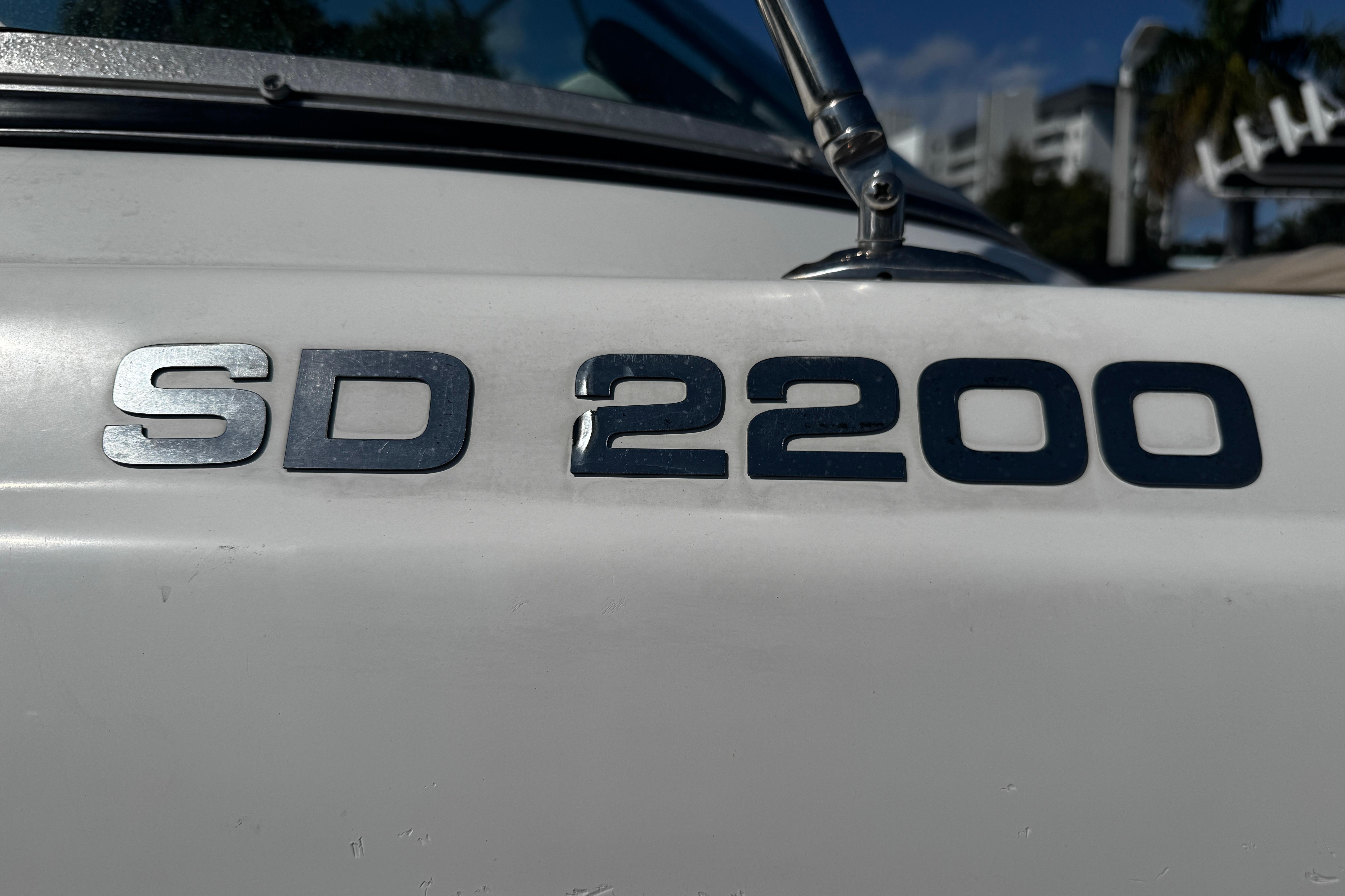 2021 Hurricane SunDeck 2200 DC OB boat emblem close-up.