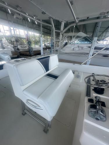 2008 SeaVee 390B boat interior with white seating and steering console.