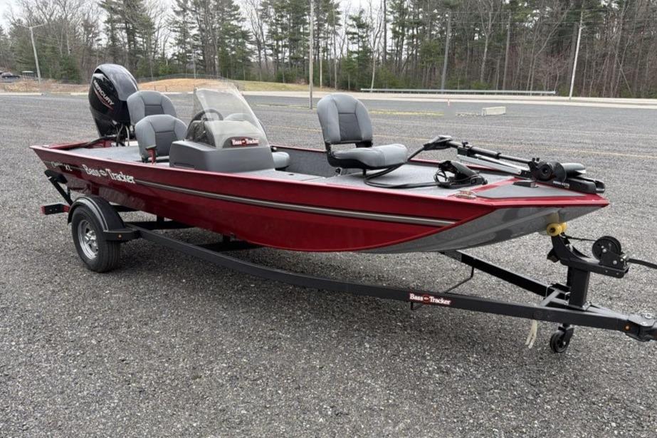 2026 Tracker Bass Tracker Classic XL boat on trailer in parking lot.