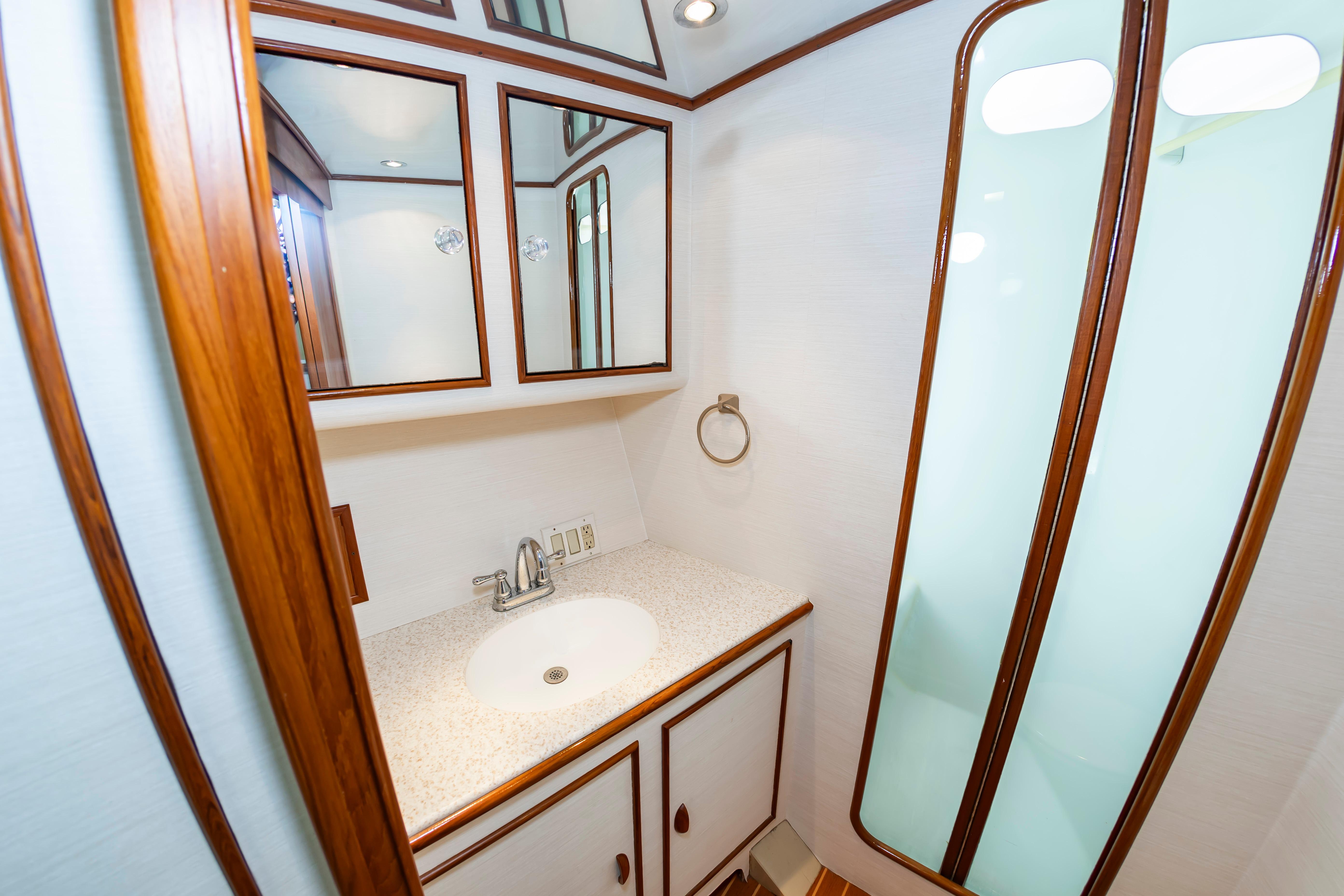 Luxurious bathroom interior of 1993 Custom Carolina Scarborough 56 Convertible yacht.