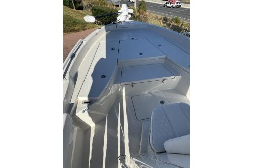 2025 Ranger 2510 Bay boat deck with seating and storage compartments.
