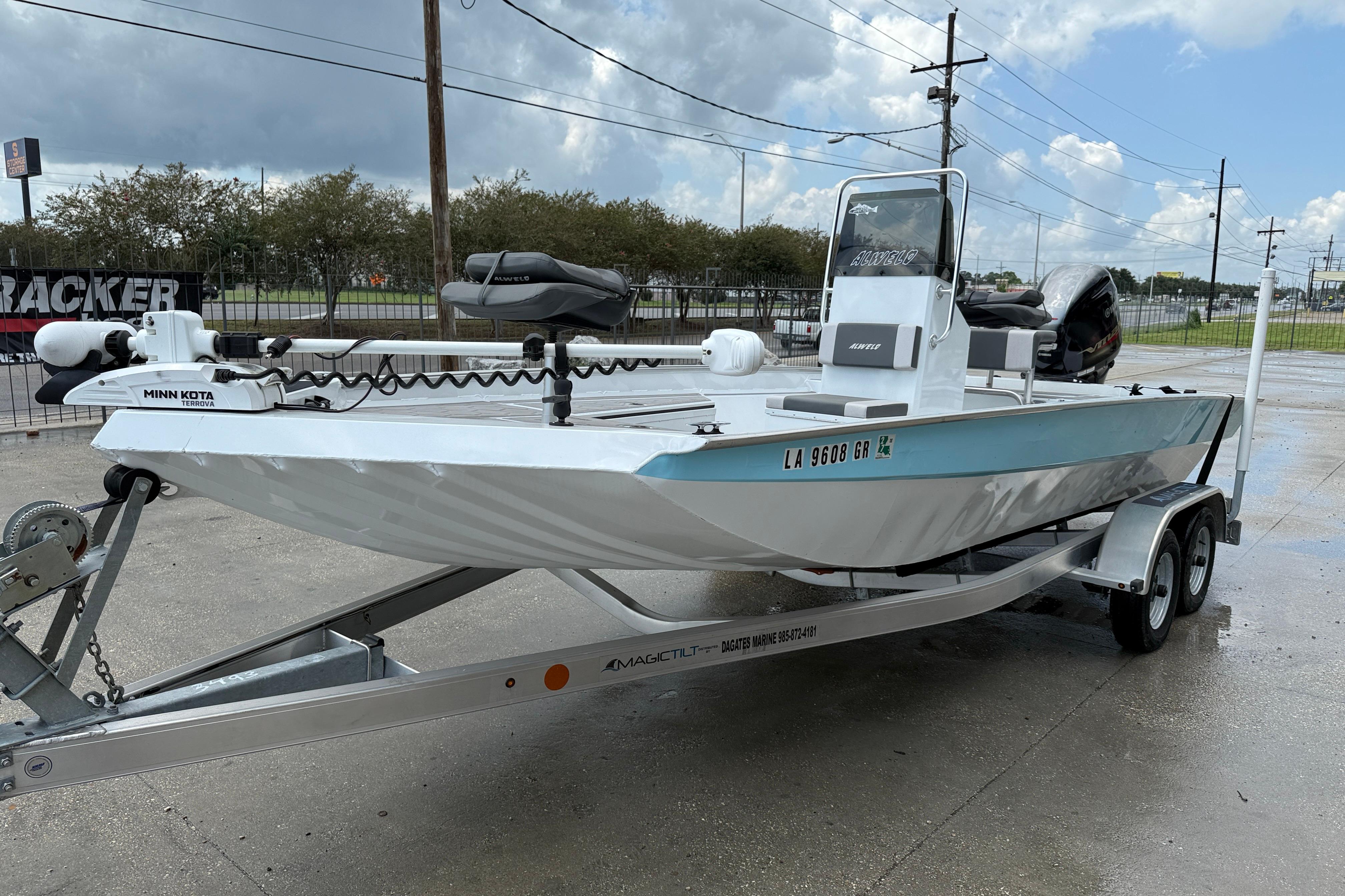 2024 Alweld 2070cc boat on trailer, featuring Minn Kota trolling motor.