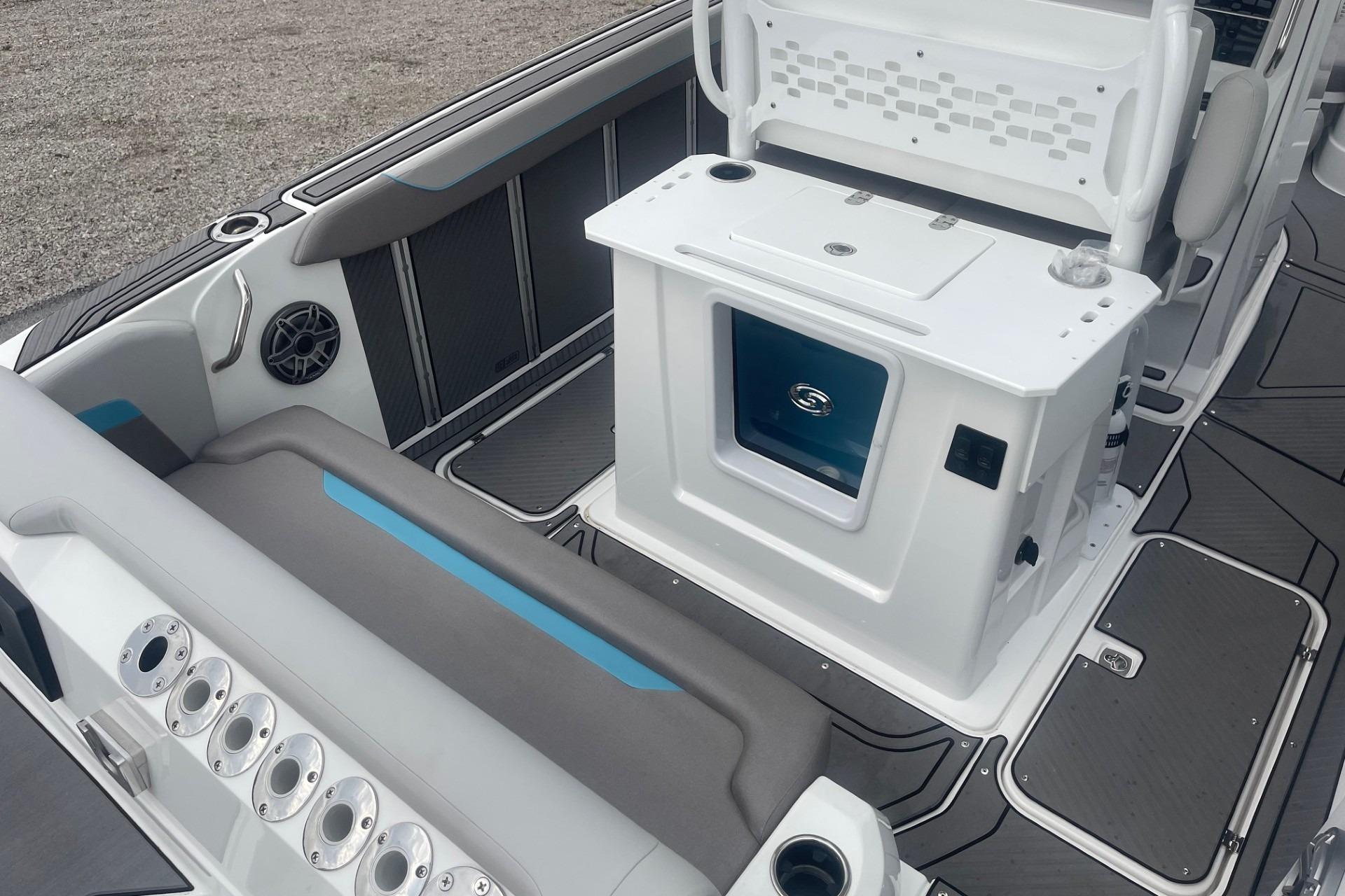 2025 Hurricane Center Console 24 OB boat interior with seating and storage features.