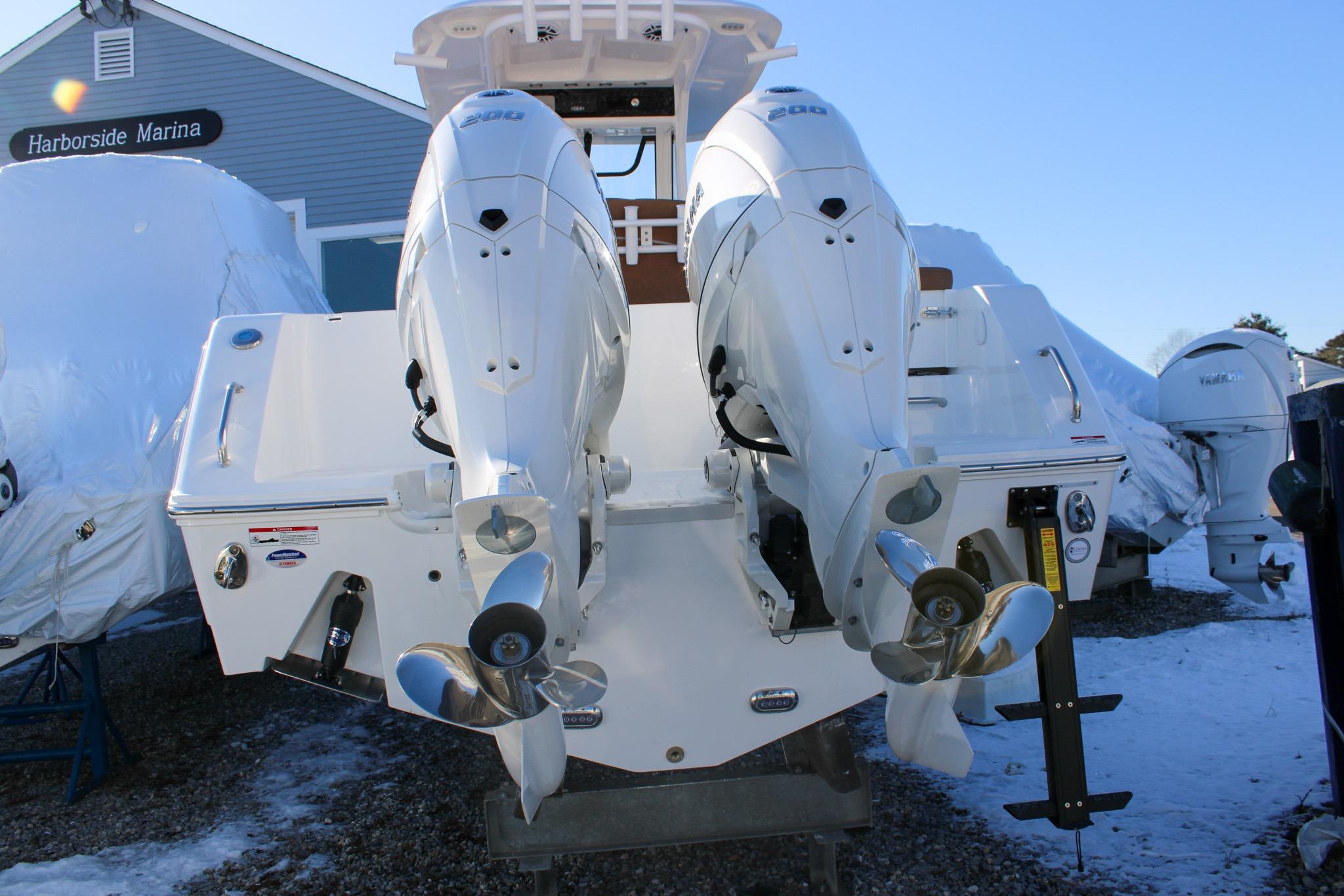 2026 Sea Hunt Gamefish 25 with dual outboard engines at Harborside Marina.