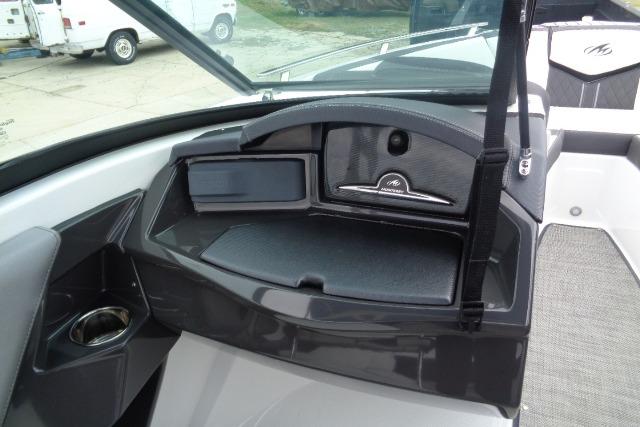 2019 Monterey 218SS Super Sport boat dashboard with storage compartment and sleek design.