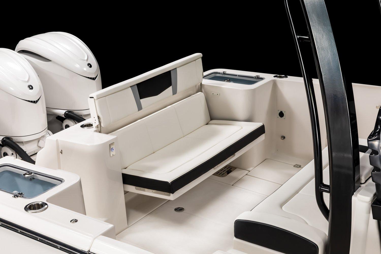 Manufacturer Provided Image: 2026 Robalo R360 Center Console boat interior with seating and dual engines.