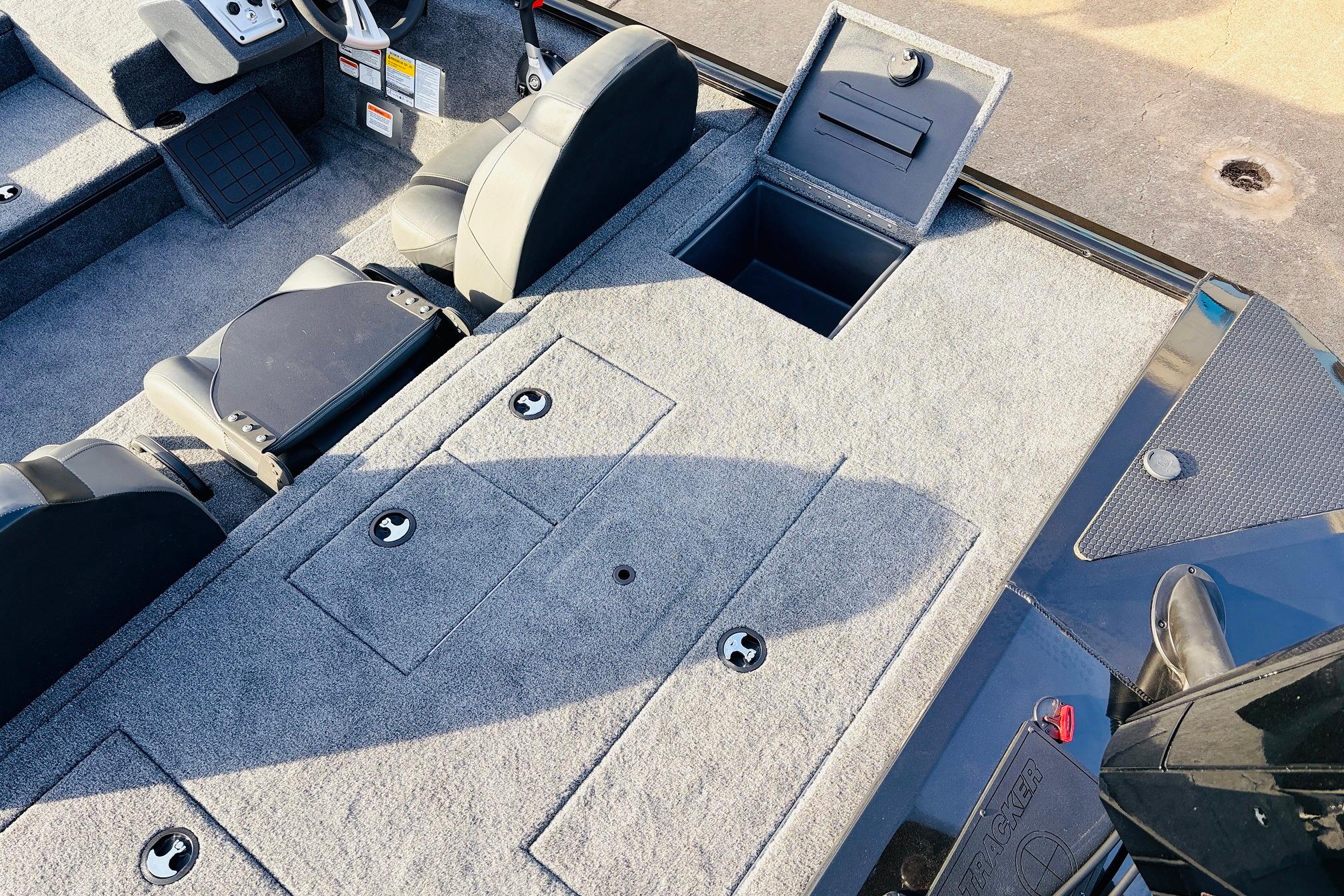 2025 Tracker Savage 215 boat interior with seating and storage compartments.