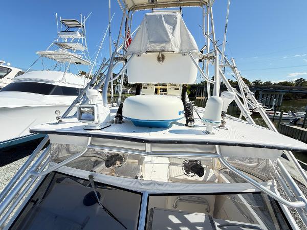 2001 Albemarle 280 Express Sport Fisherman boat with diesel power, docked at a marina.