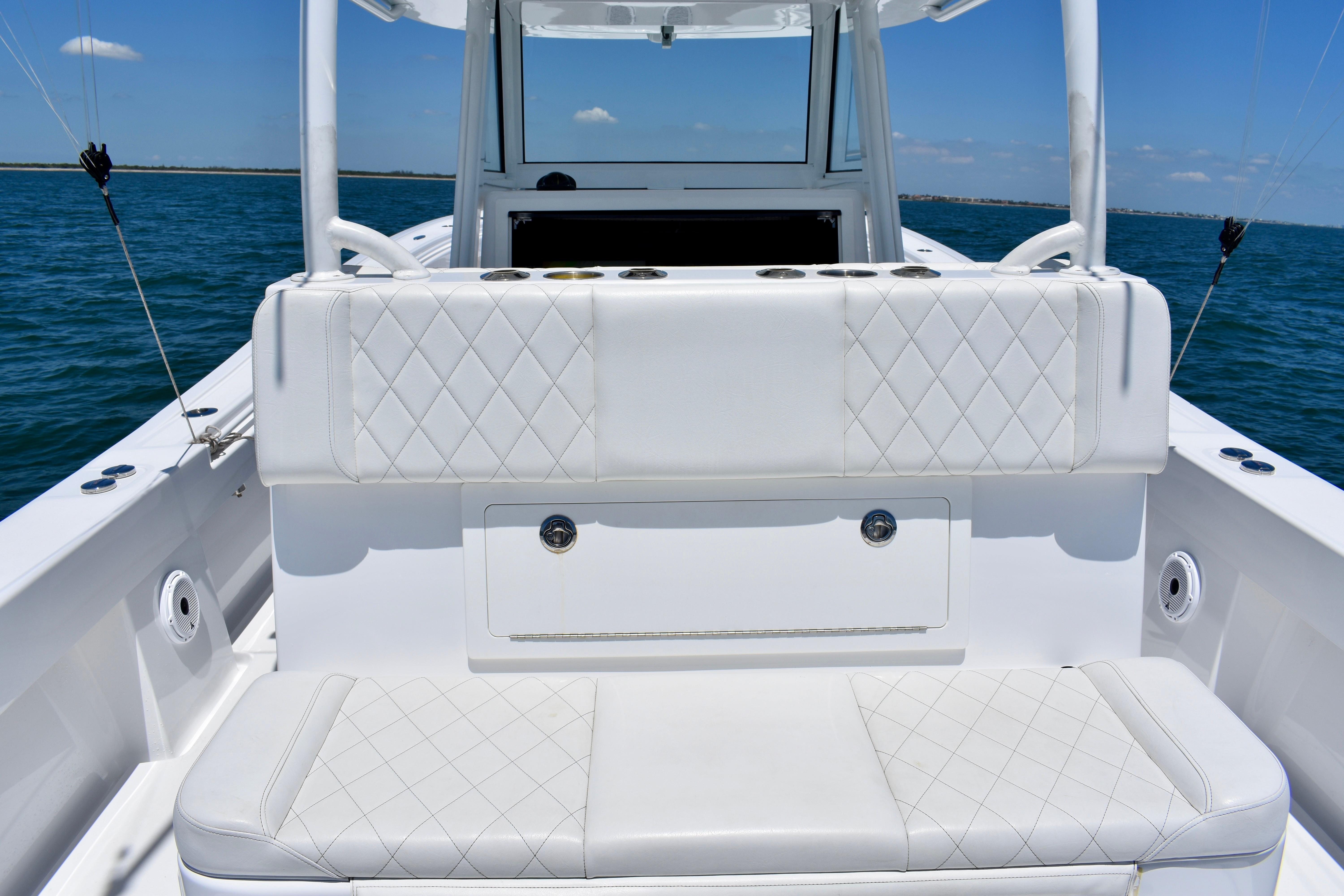 2022 Onslow Bay 41 Tournament boat interior with white cushioned seating on open water.
