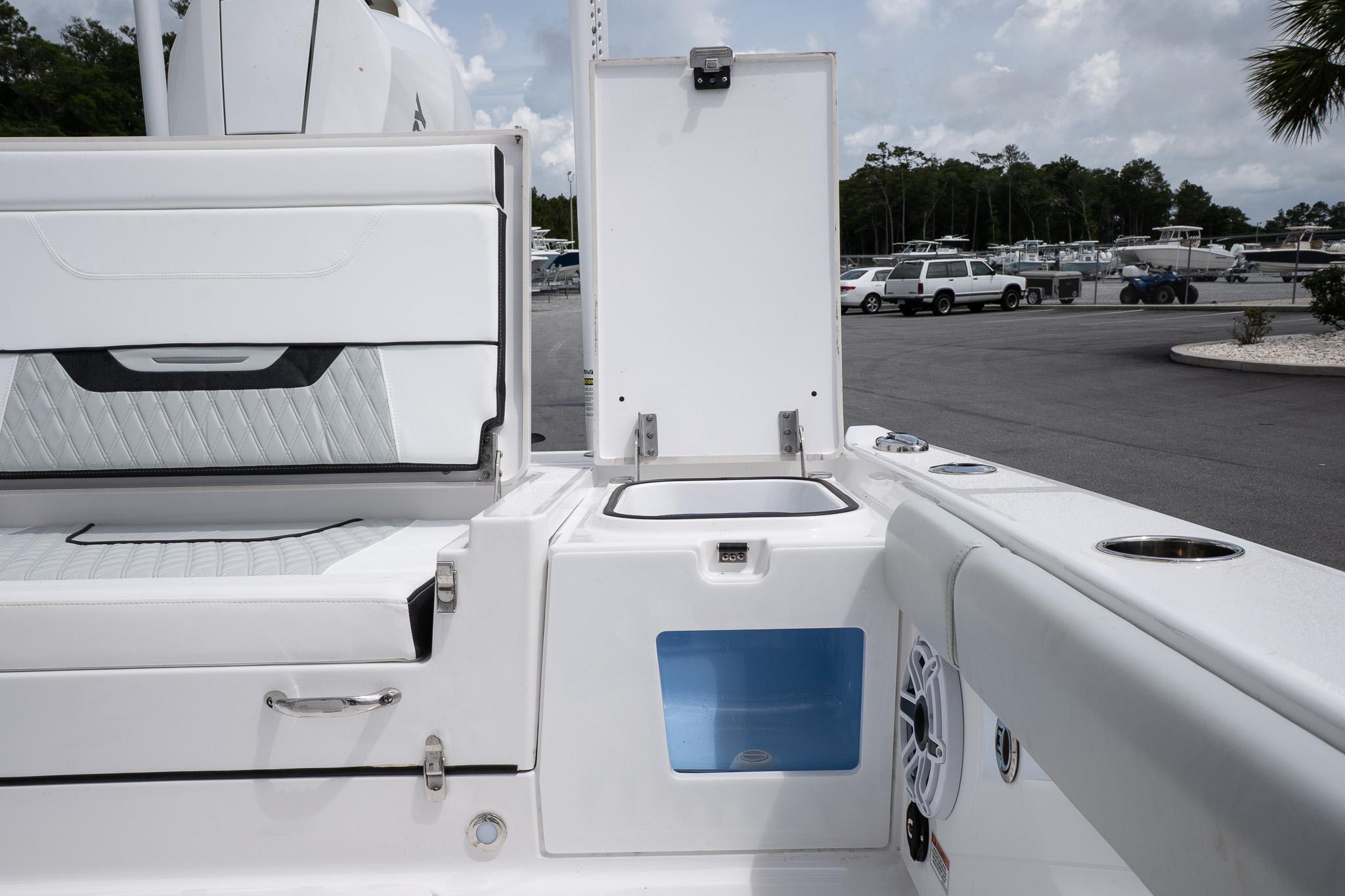 2026 Blackfin 262 HB boat interior with open storage compartments and seating.