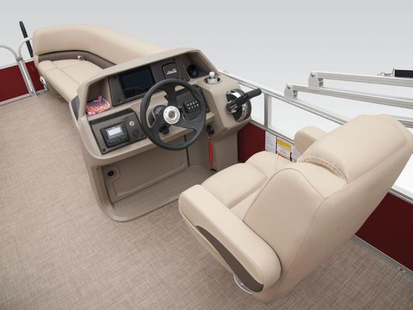 2024 Sun Tracker PARTY BARGE® 18 DLX interior with beige seating and steering console.