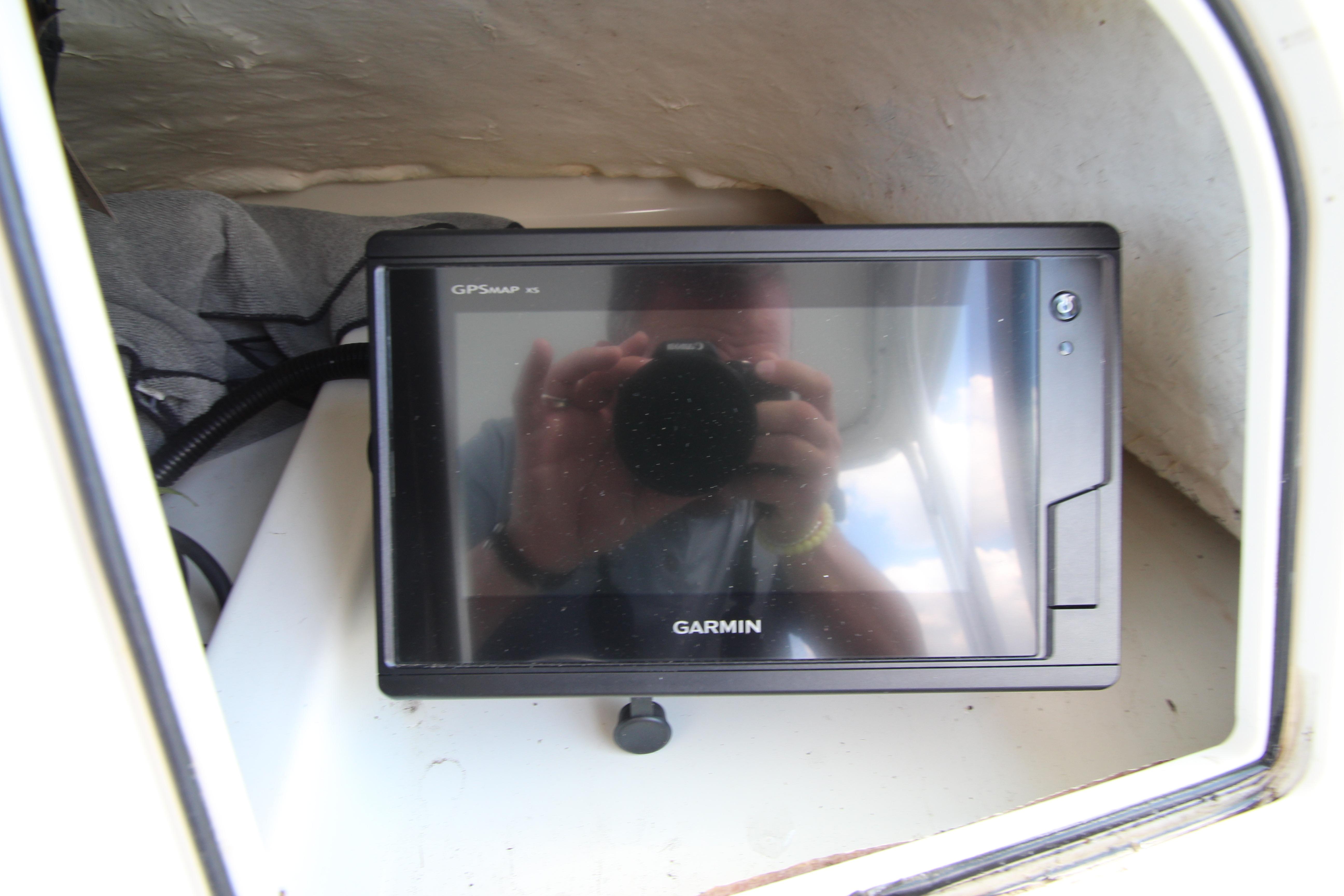 Garmin GPS device inside a 2002 Hydra-Sports 230 WA boat cabin.