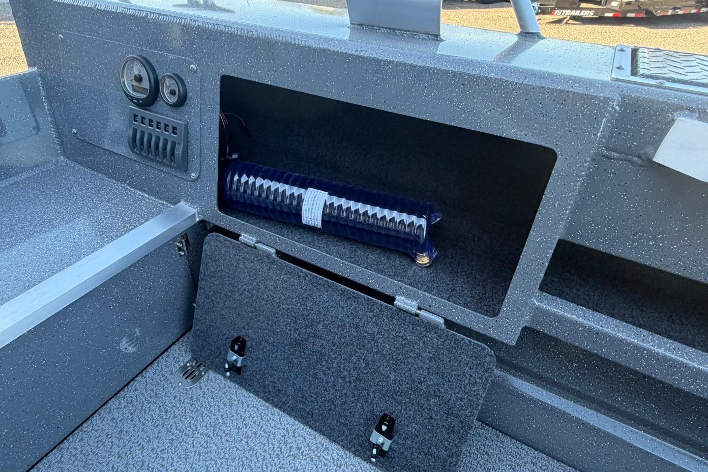 Interior view of 2026 Thunder Jet 209 Rush OT boat storage compartment.