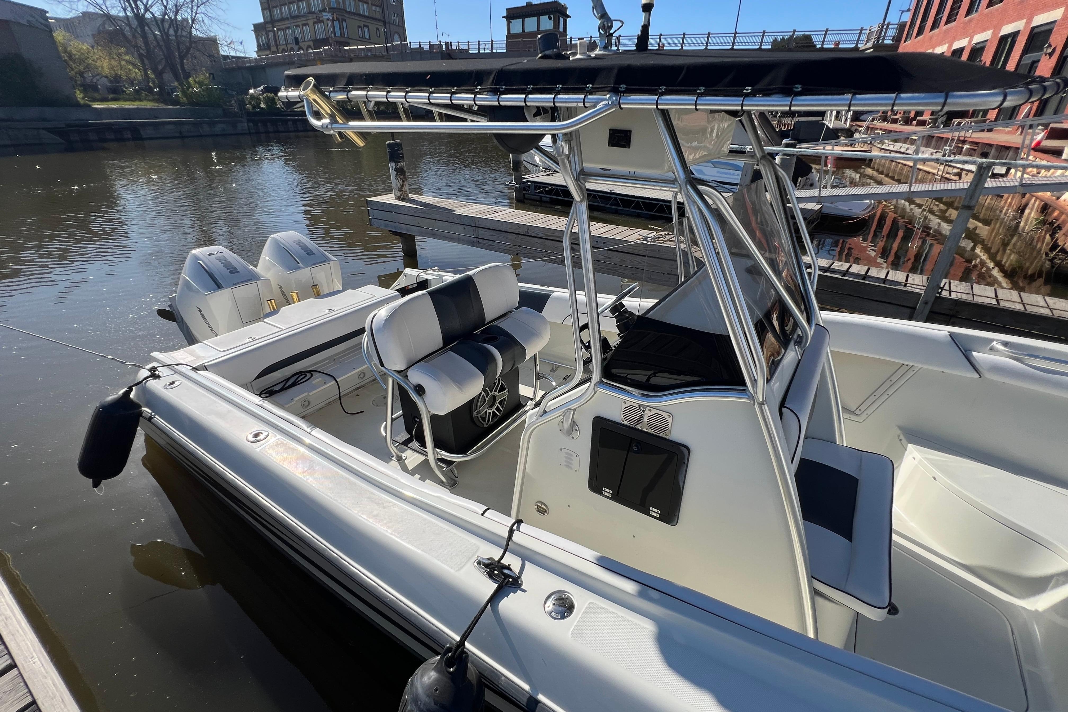 2001 Hydra-Sports Vector 2600 CC boat docked, featuring dual engines and sleek design.