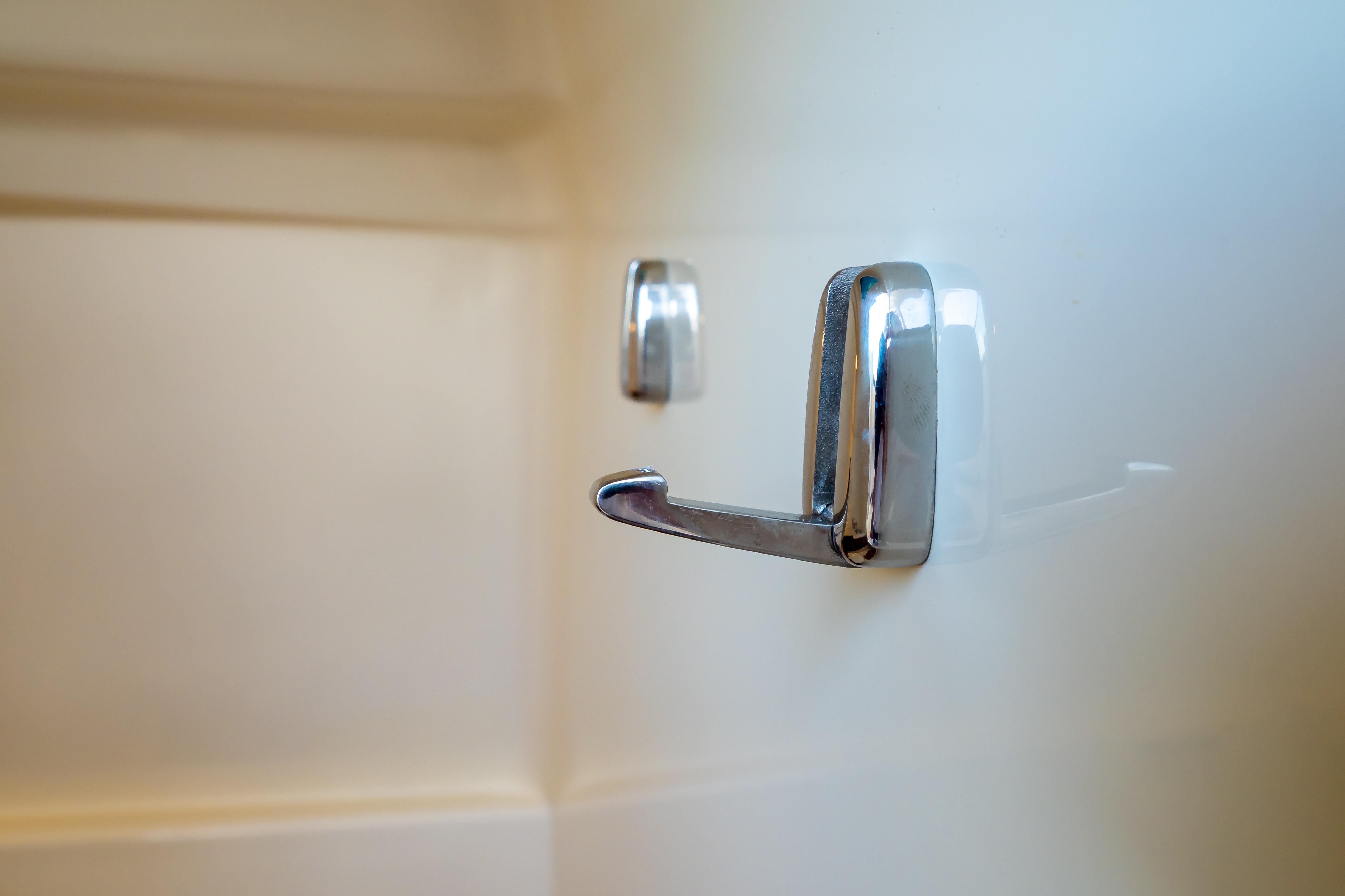 Chrome hook on Boston Whaler 270 Vantage 2019 interior wall.