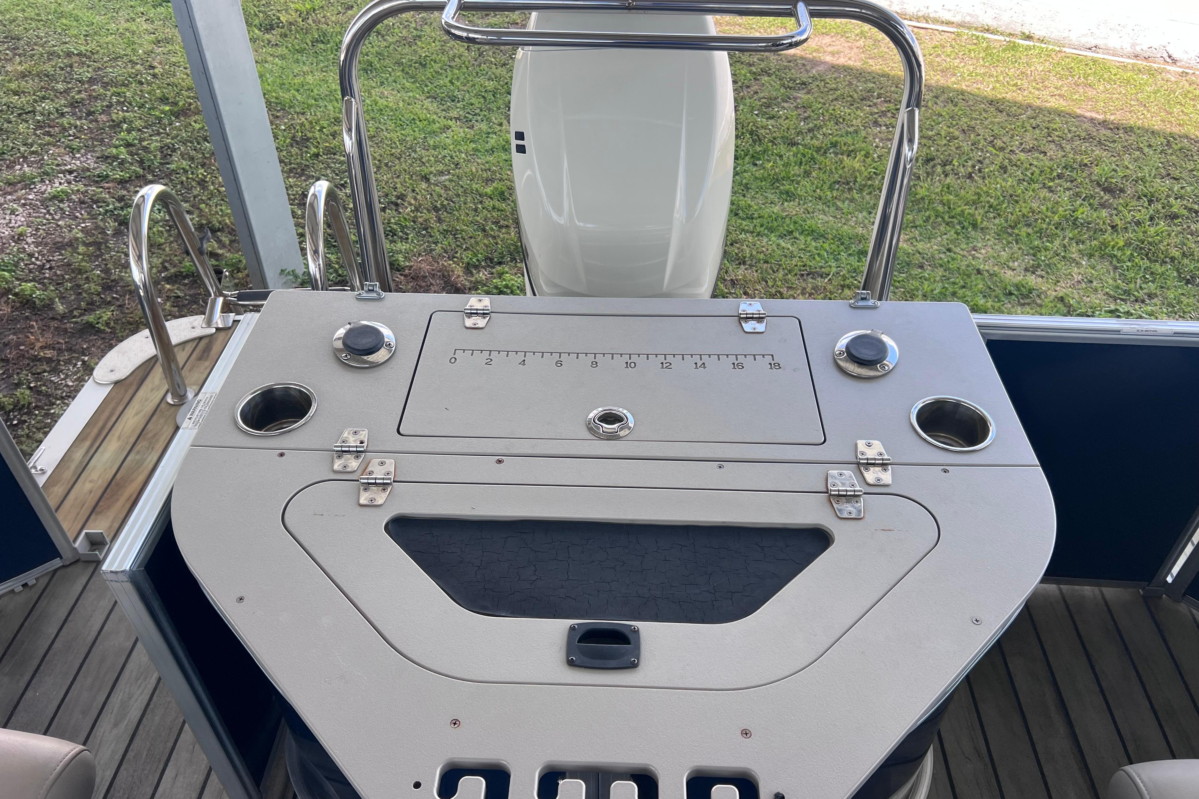 2018 Berkshire 25 STS Tri Toon boat deck with fishing station and cup holders.