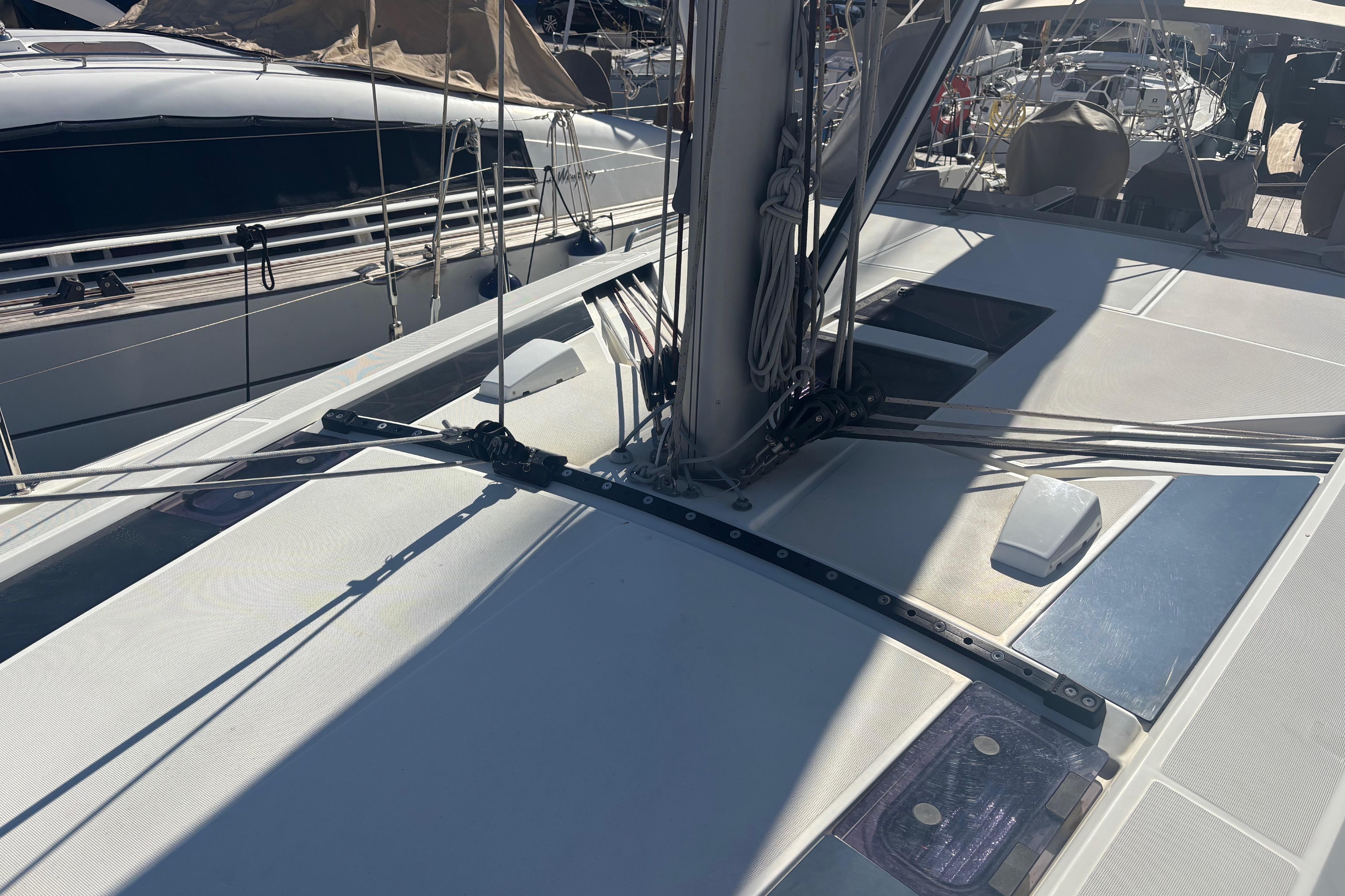 Deck view of 2023 Beneteau Oceanis 46.1 sailboat, showcasing rigging and fittings.