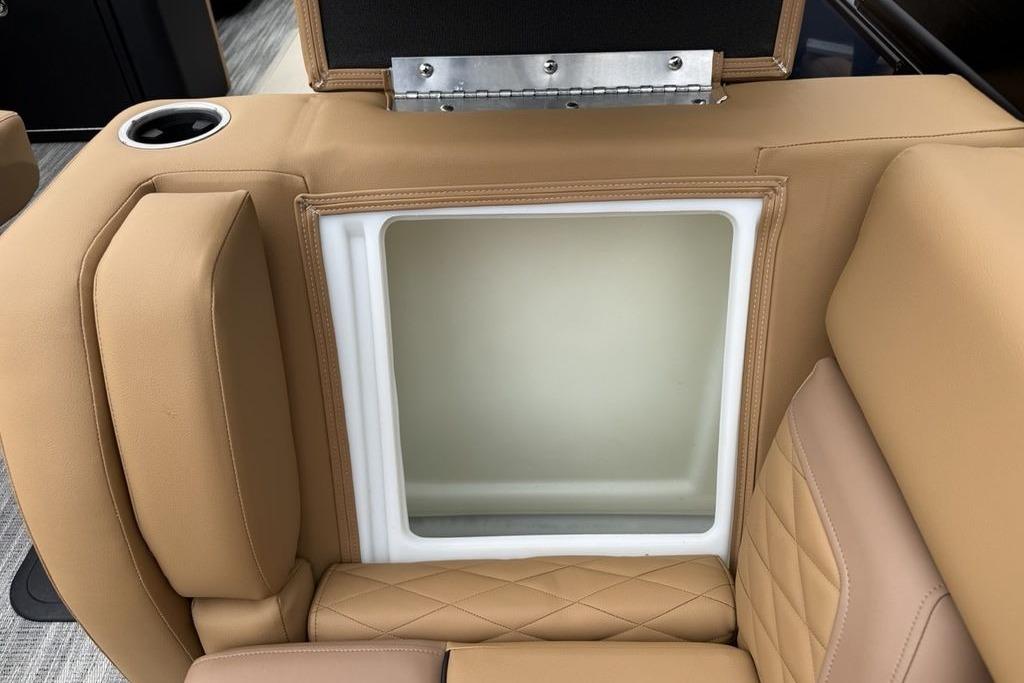 Tan leather seating with built-in storage on a 2026 Godfrey Monaco 235 SFLC iMPACT.