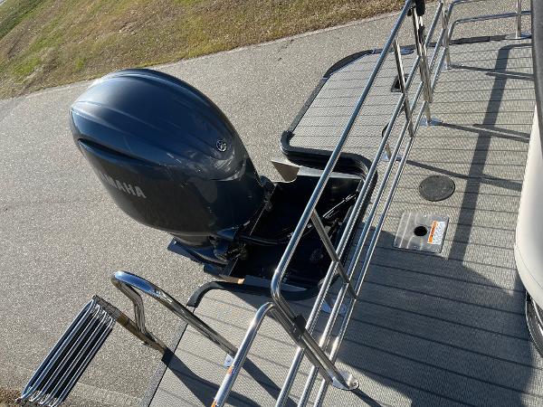 2024 Starcraft SLS3 boat with Yamaha outboard motor, rear deck view.