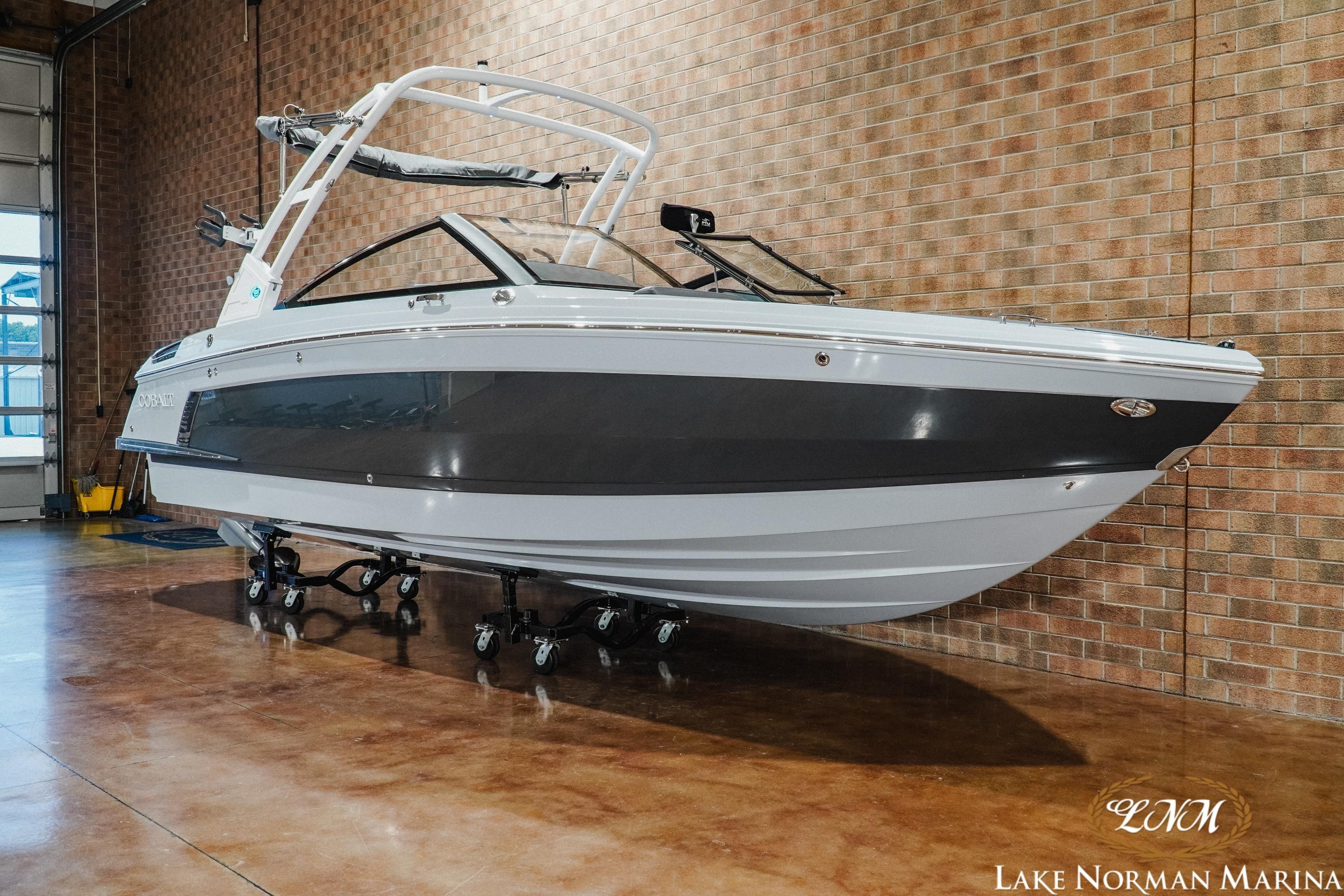 2026 Cobalt R4 Surf boat displayed indoors at Lake Norman Marina.