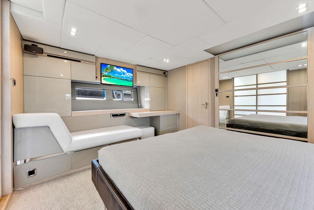 Luxurious interior of 2012 Fairline Targa 58 yacht with modern furnishings and TV.