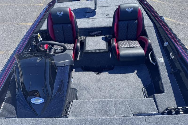 2026 Phoenix 819 ZXL boat interior with dual seats and steering wheel.