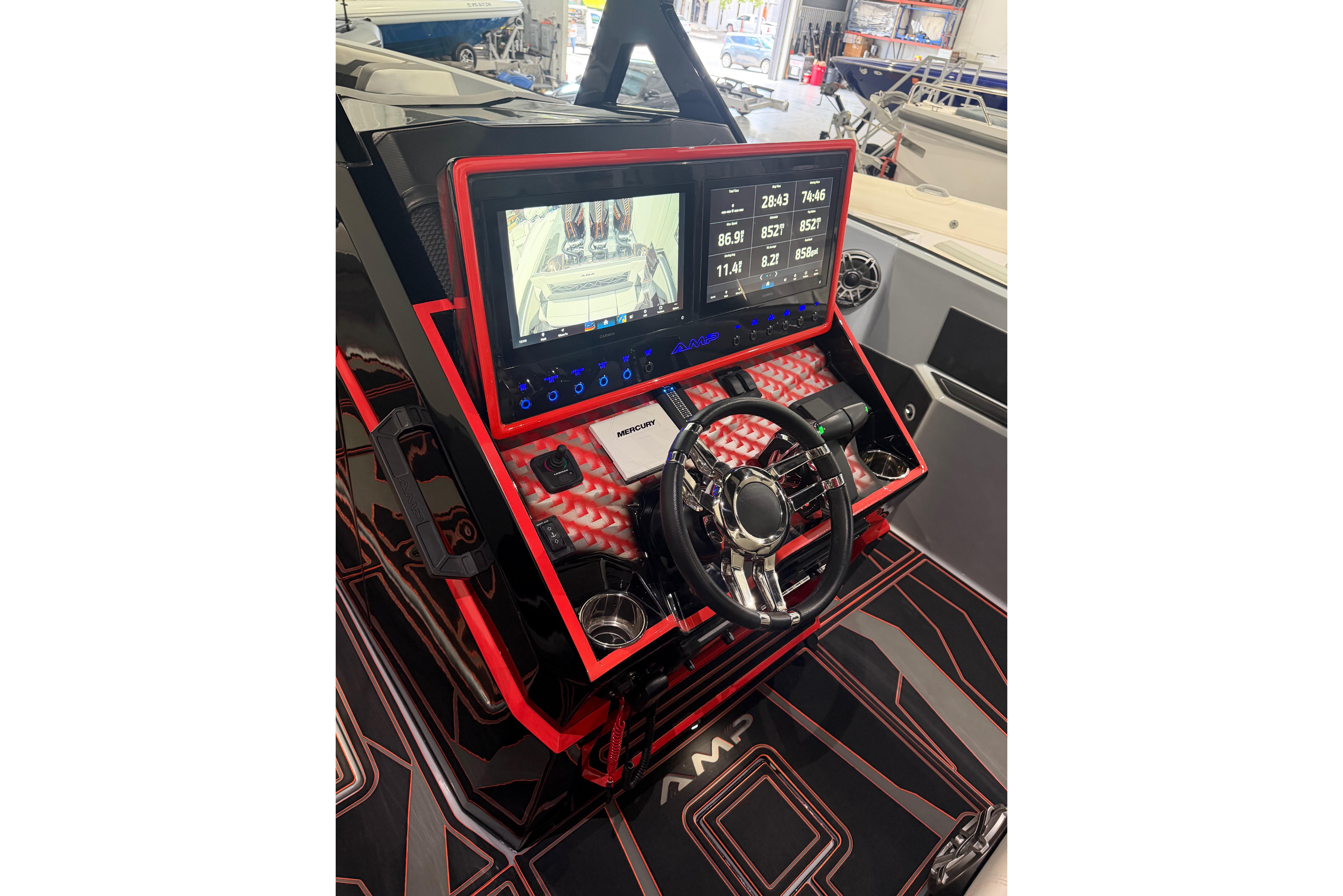 Futuristic AMP 333 boat dashboard with advanced controls and display, 2026 model.