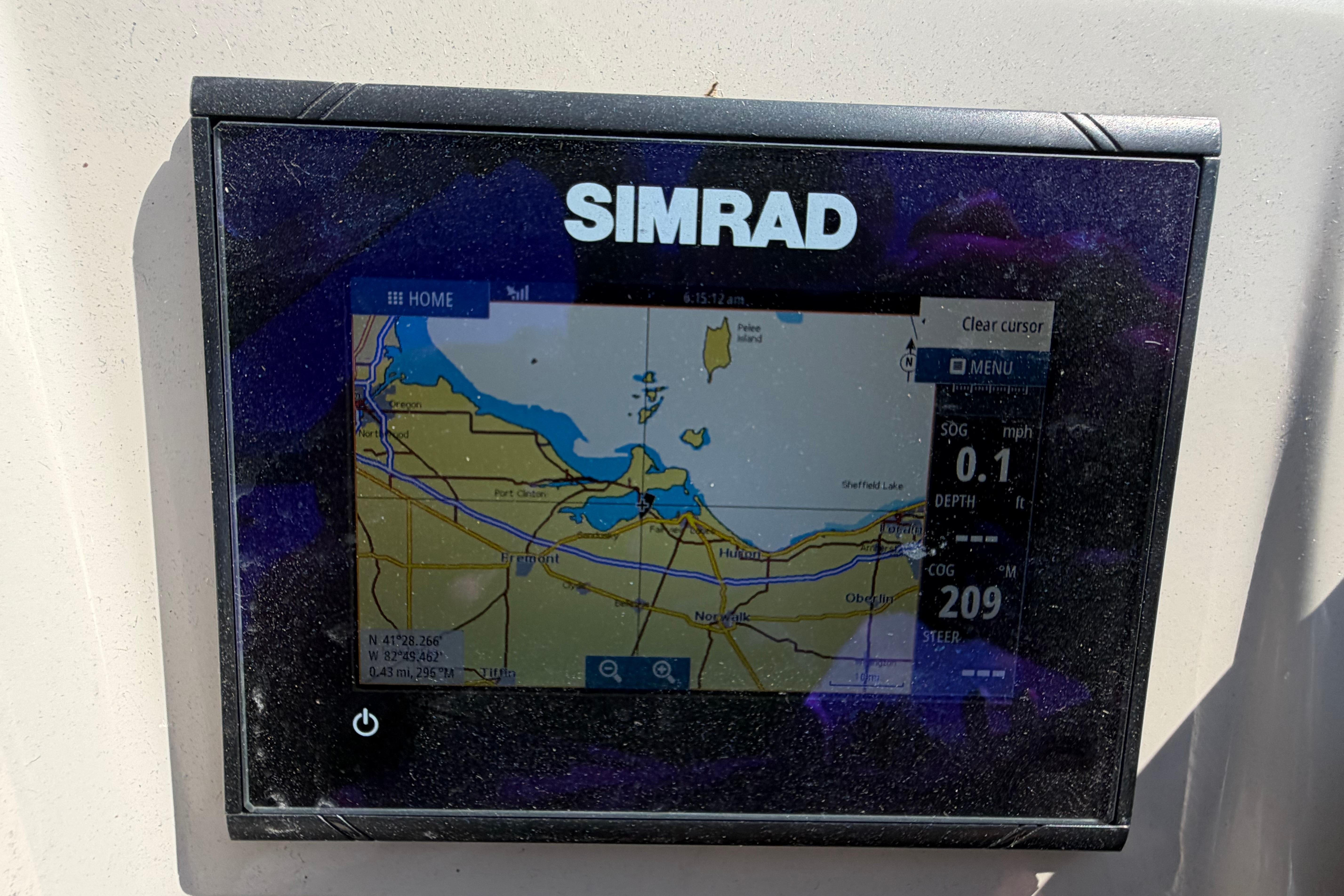 Simrad navigation display on a 2017 Bennington 25 SSXAPG boat, showing a detailed map.