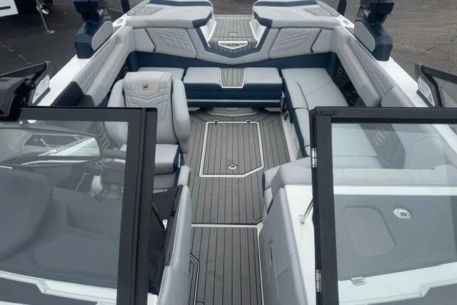 Interior view of 2022 Nautique Super Air Nautique G21 boat with sleek seating and modern design.