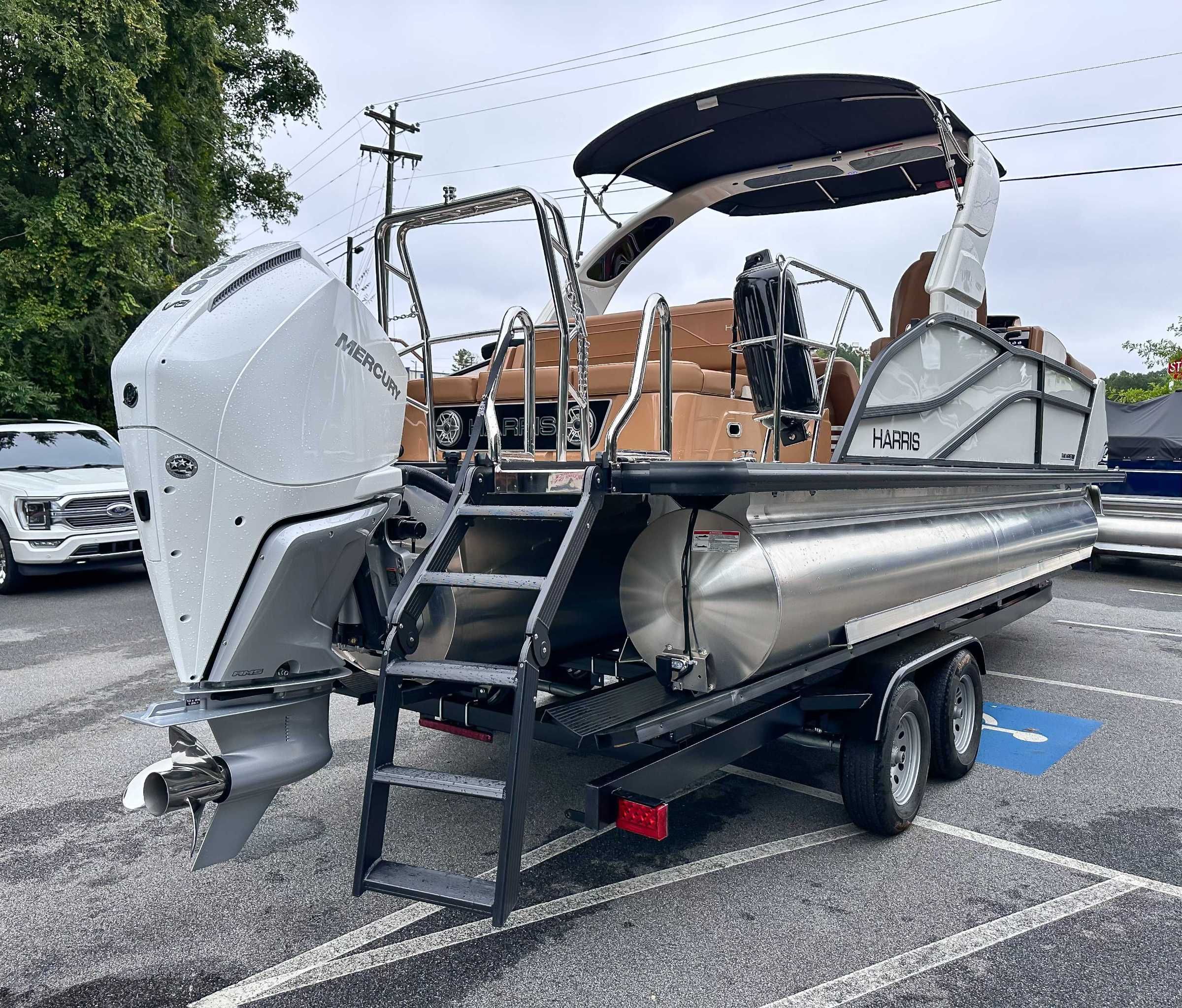 2025 Harris Grand Mariner 230 SLDH pontoon boat on trailer.