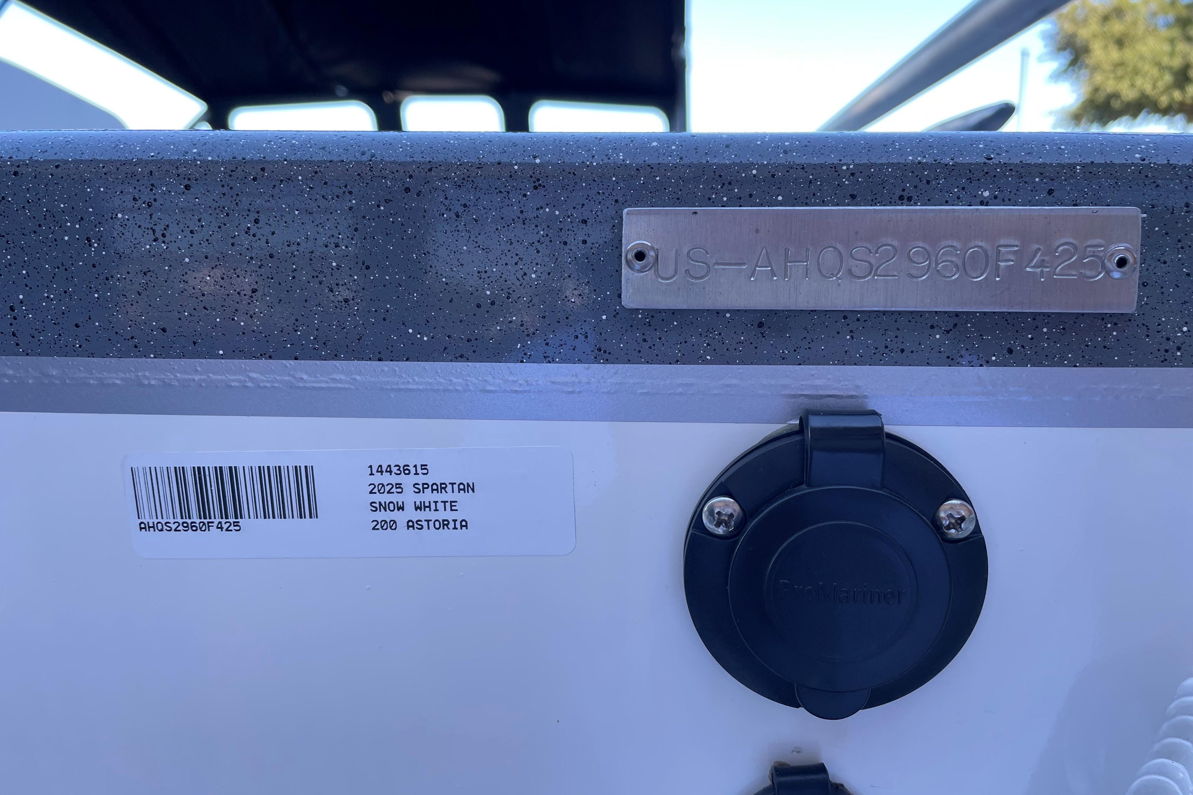 2025 Spartan 200 Astoria boat identification plate and connector port.